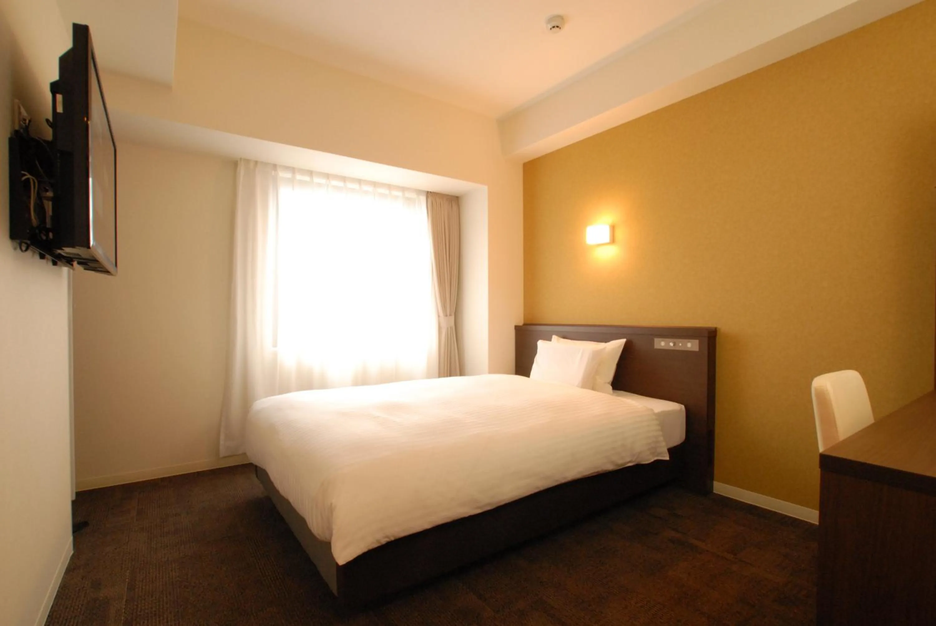 Bed in AB Hotel Isesaki