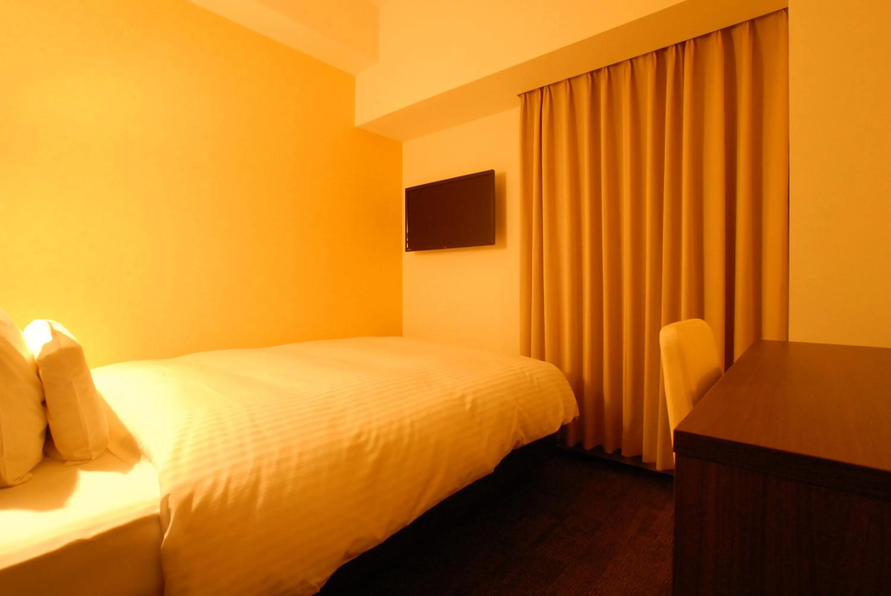 Bed in AB Hotel Mikawa Toyota