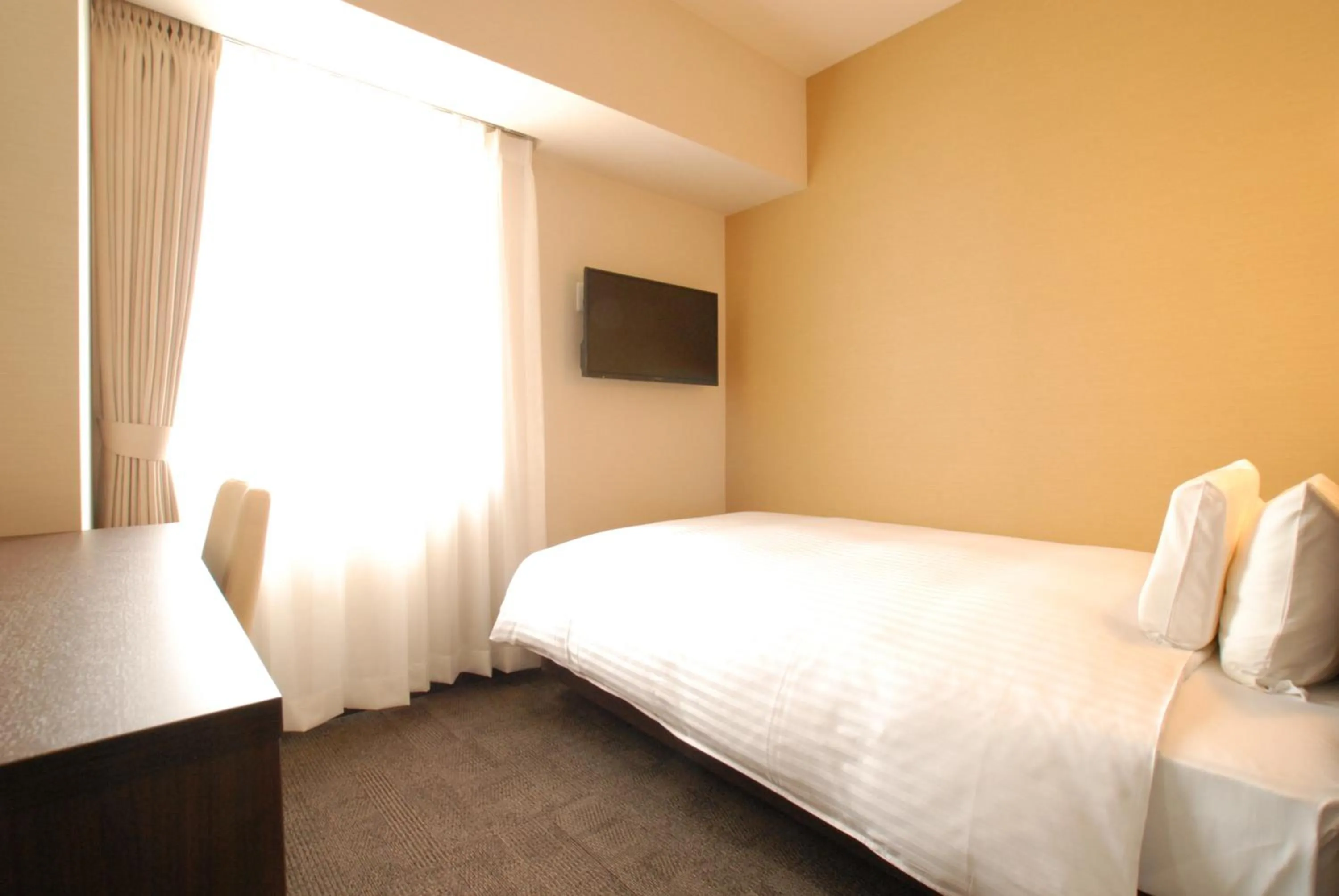 Bed in AB Hotel Gifu