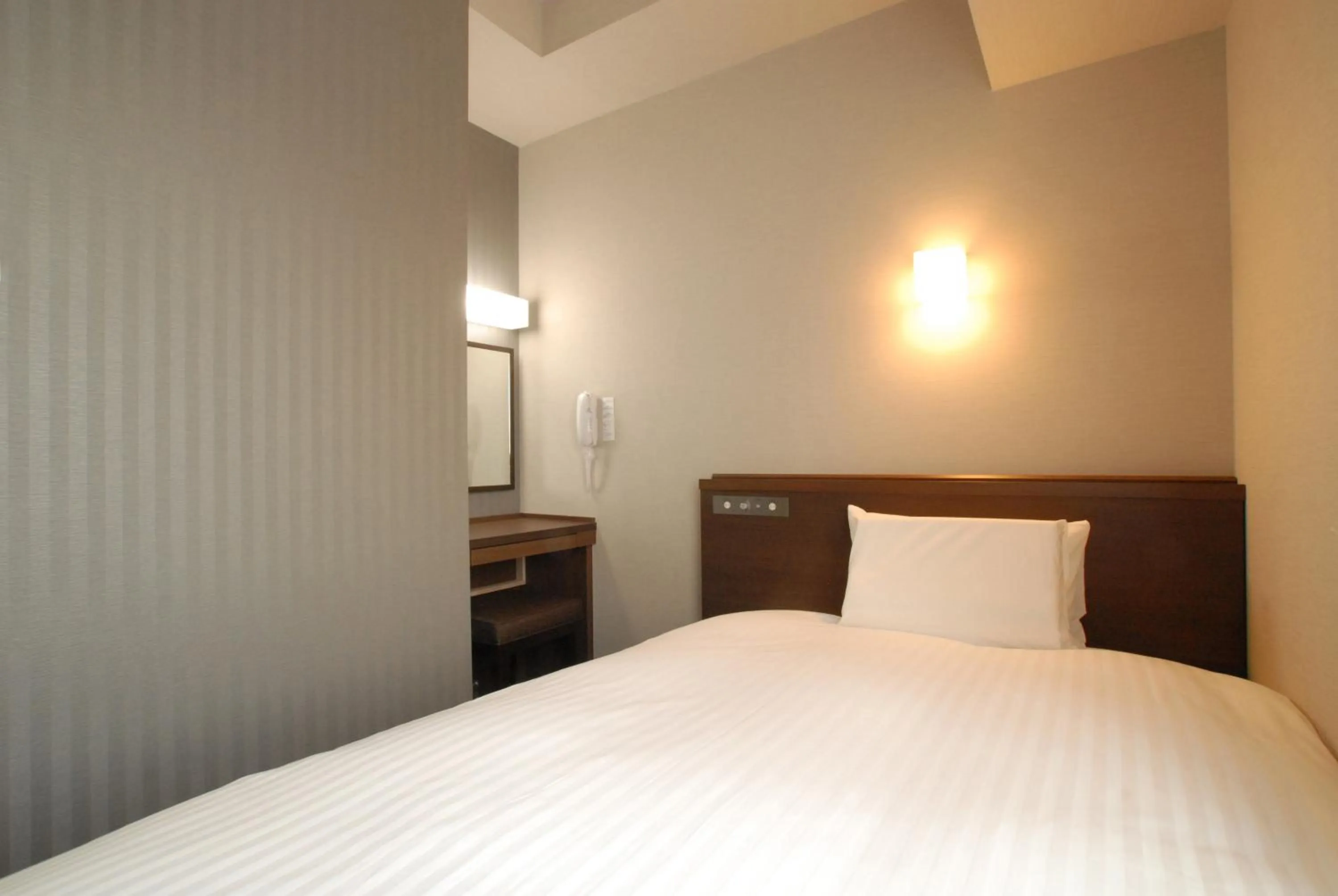 Bed in AB Hotel Gifu