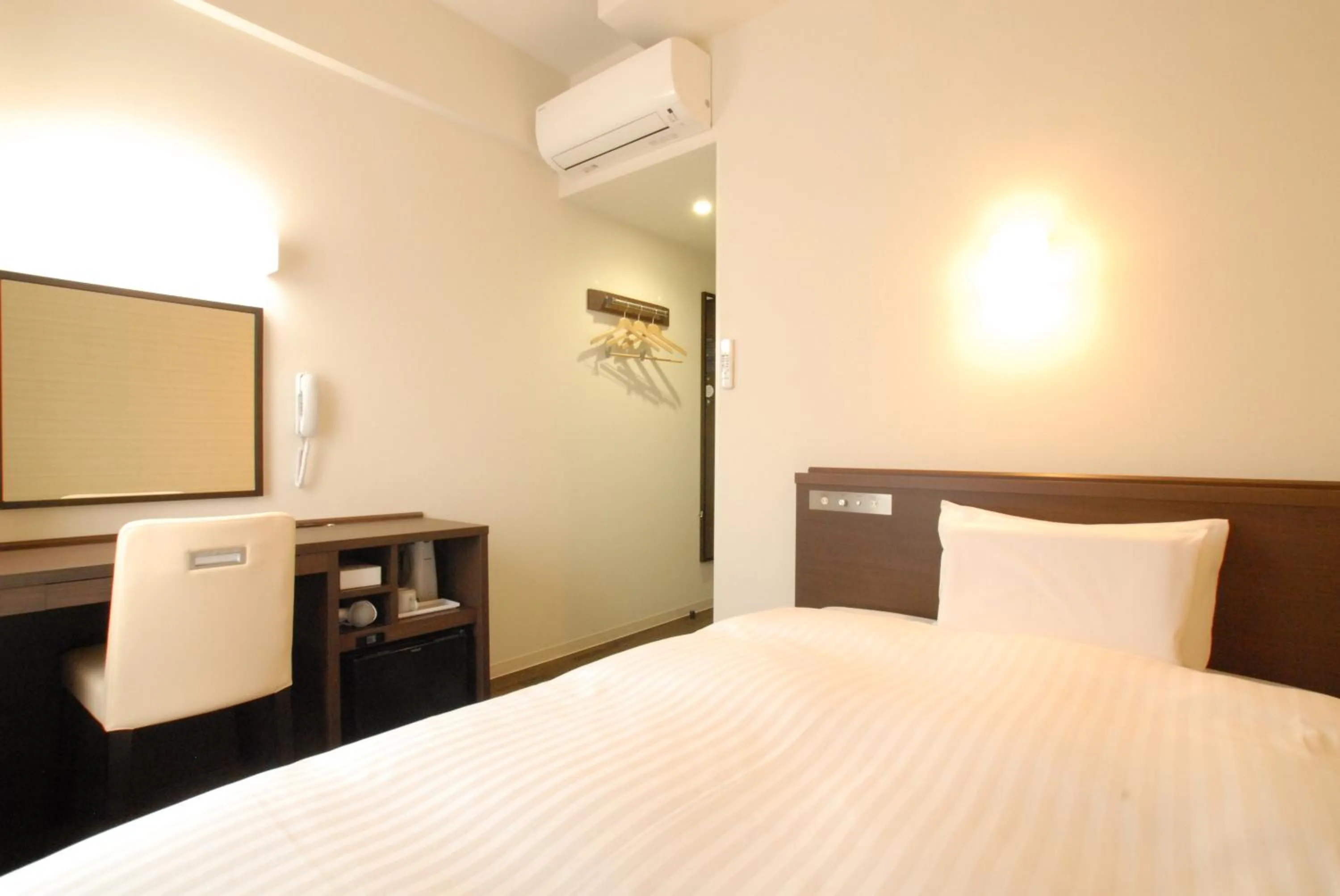 Bed in AB Hotel Iwata