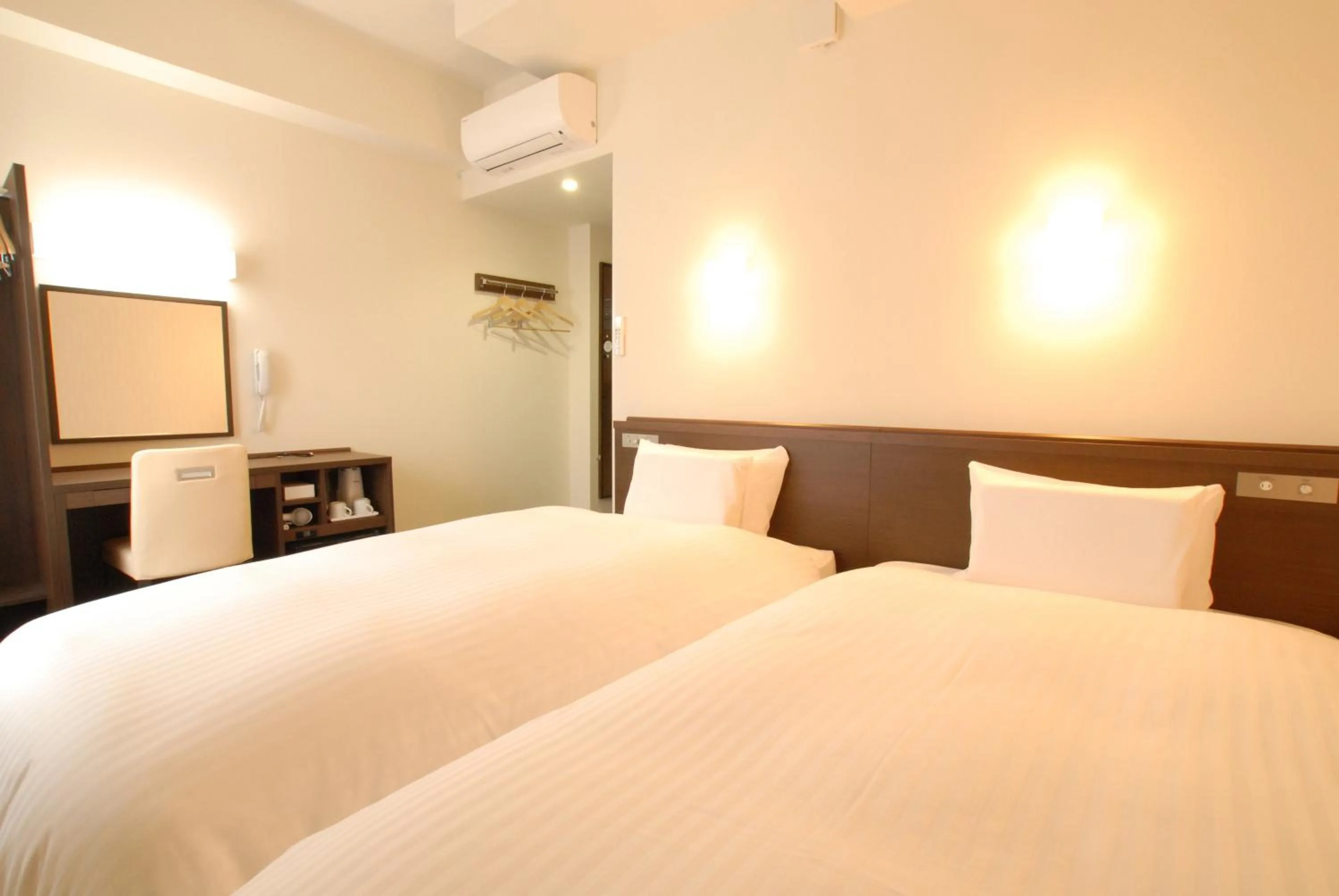 Bed in AB Hotel Iwata