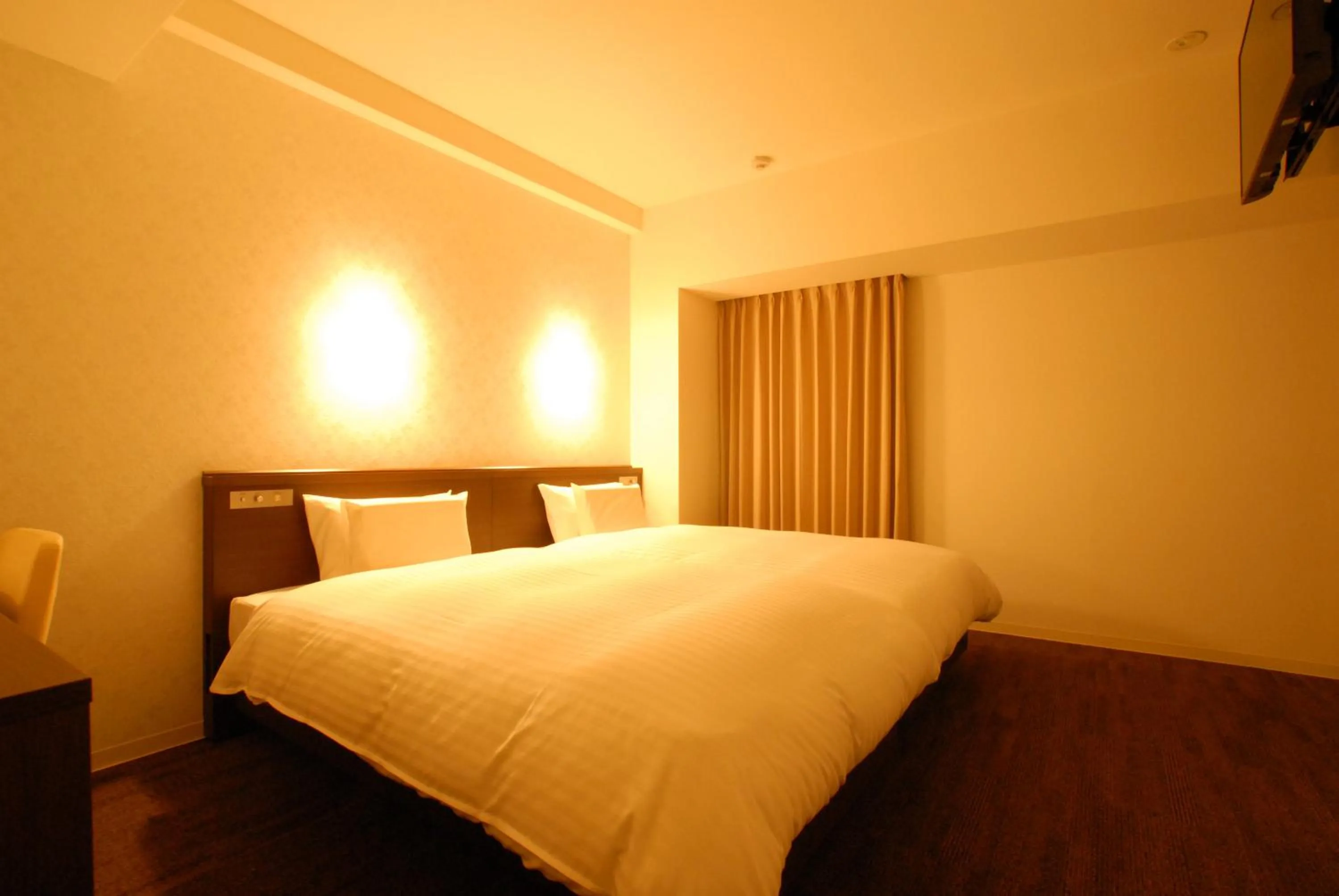 Bed in AB Hotel Iwata
