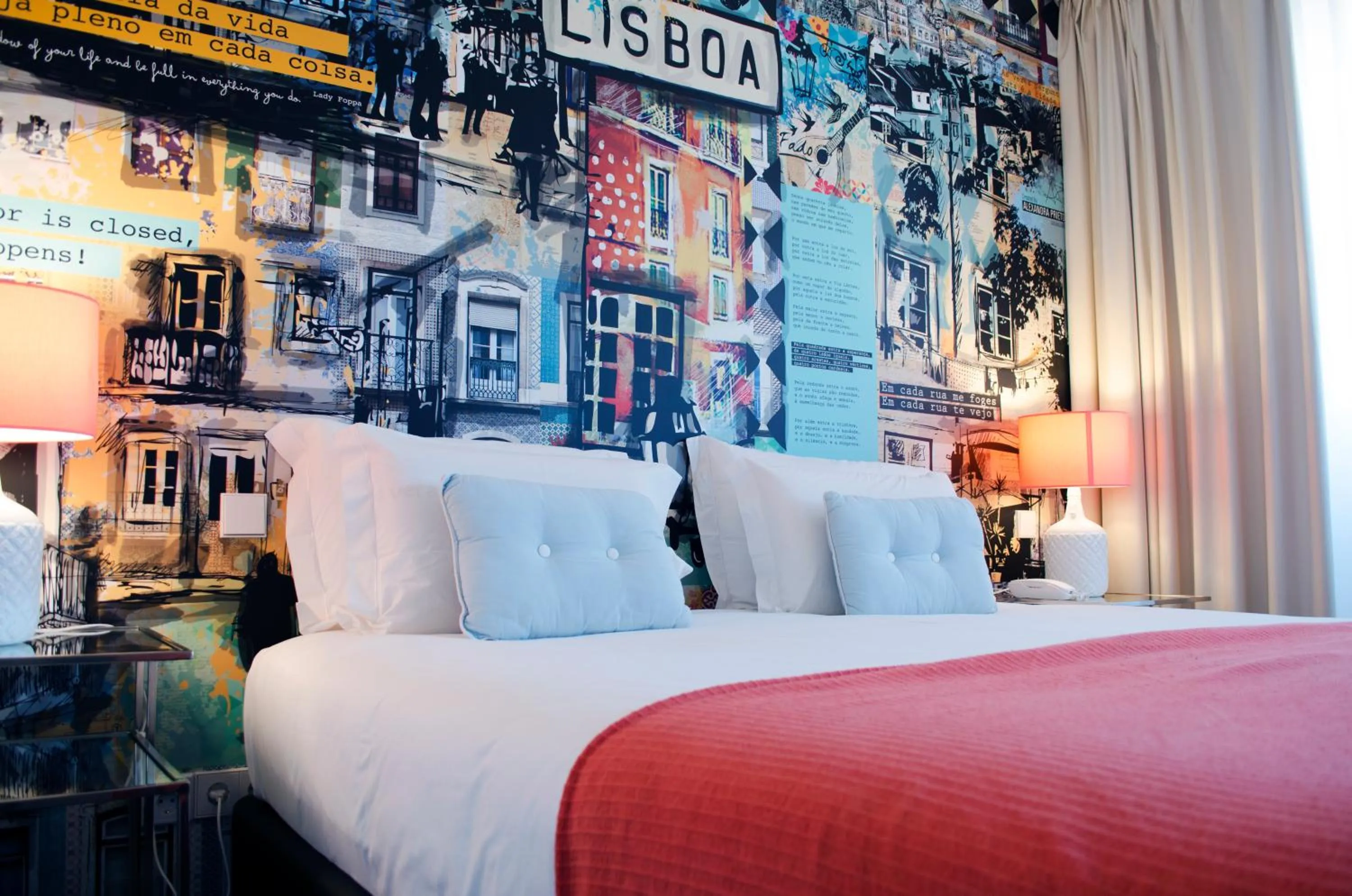 Bed in The ART INN Lisbon