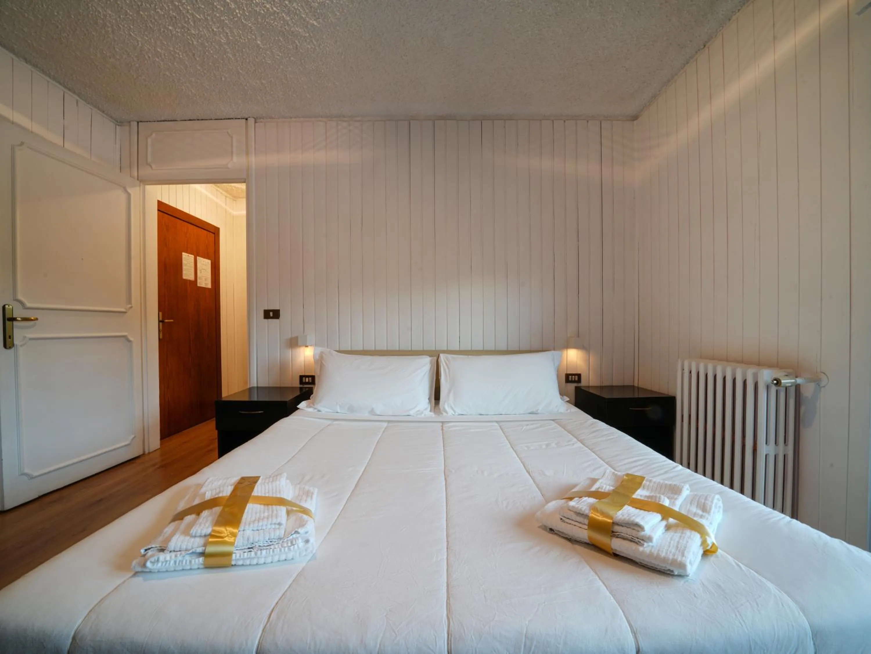 Bed in Hotel Arlecchino - Dada Hotels