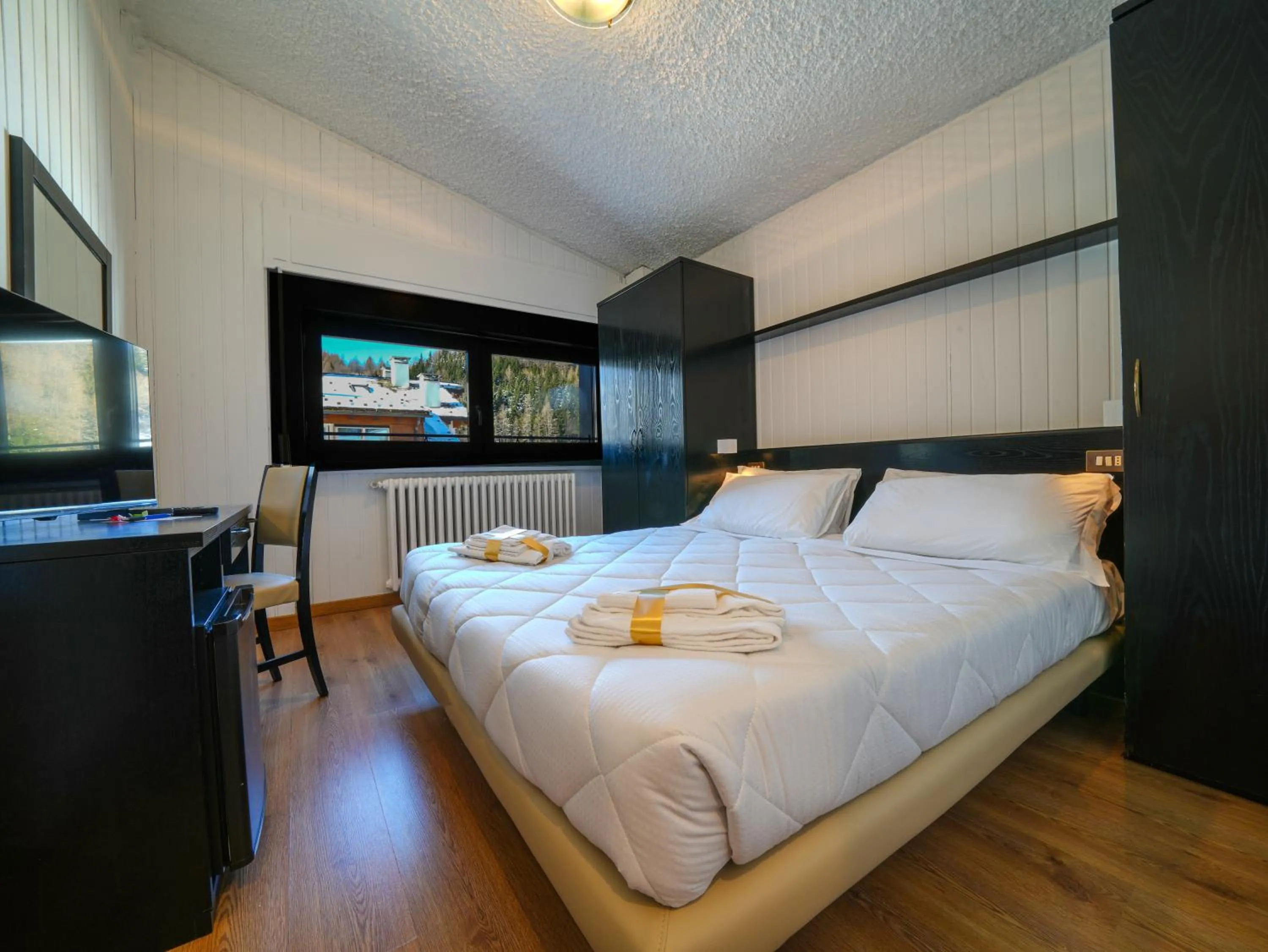 Bed in Hotel Arlecchino - Dada Hotels