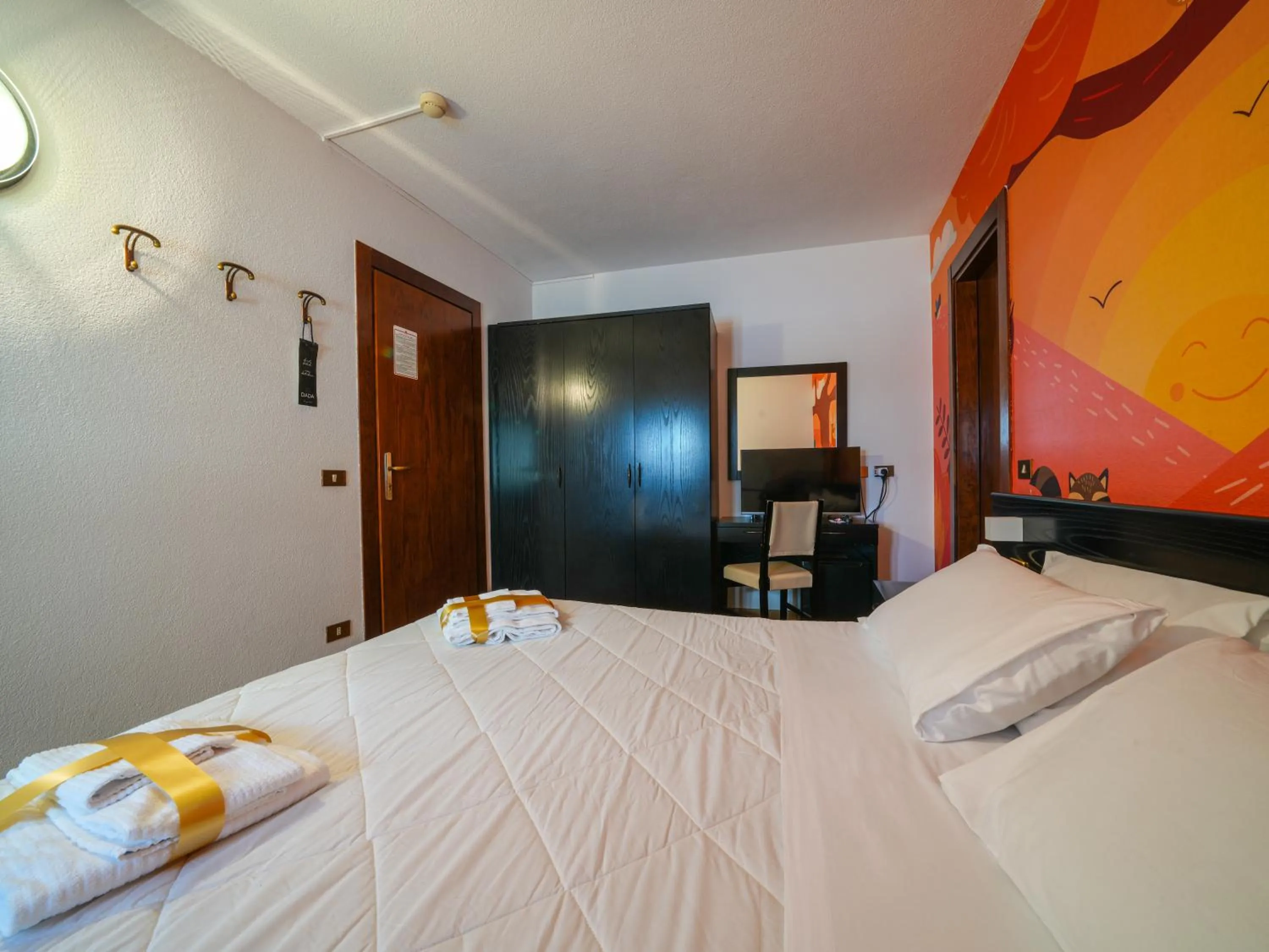 Bed in Hotel Arlecchino - Dada Hotels