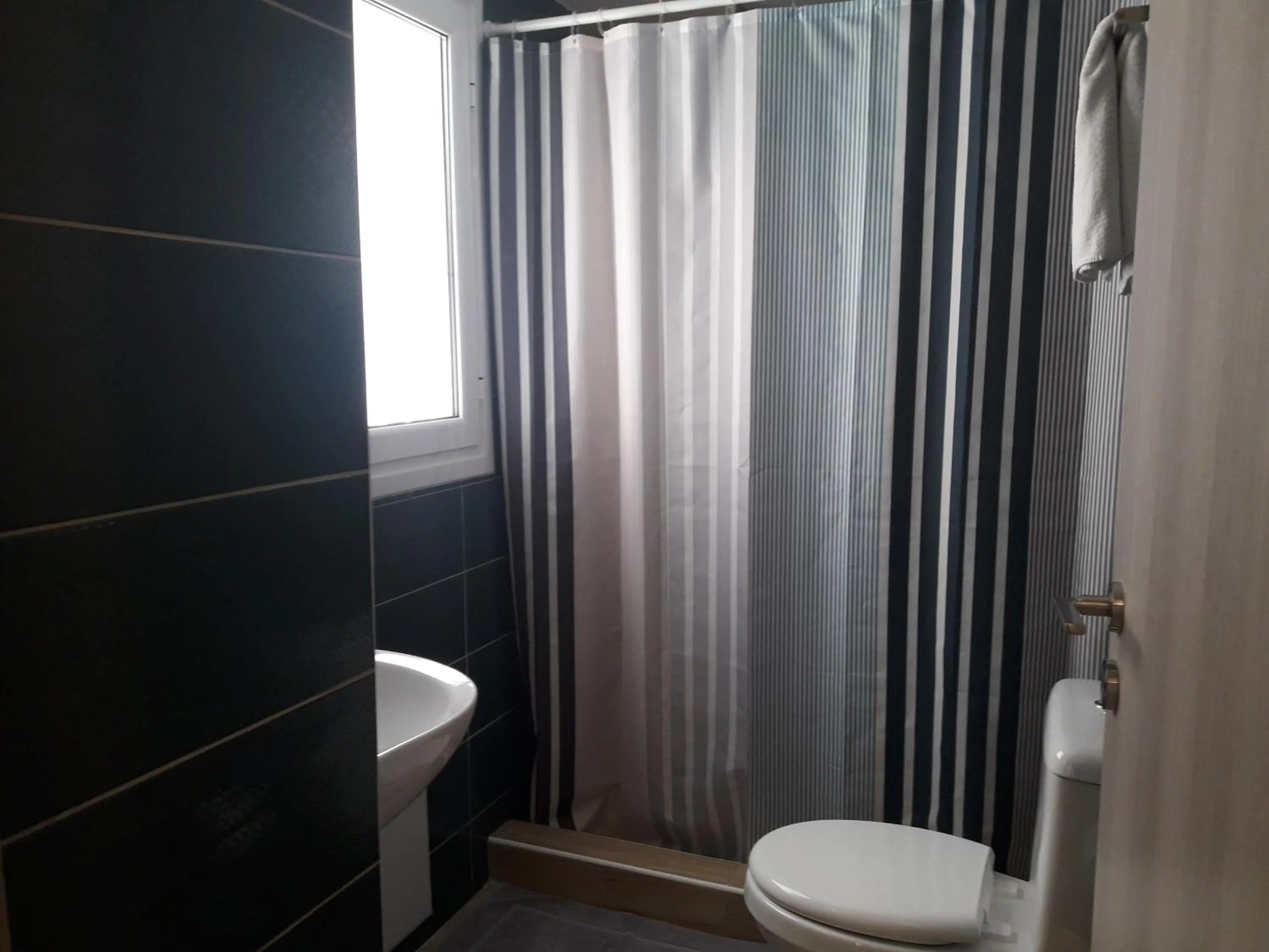 Bathroom in Achillion Hotel Piraeus