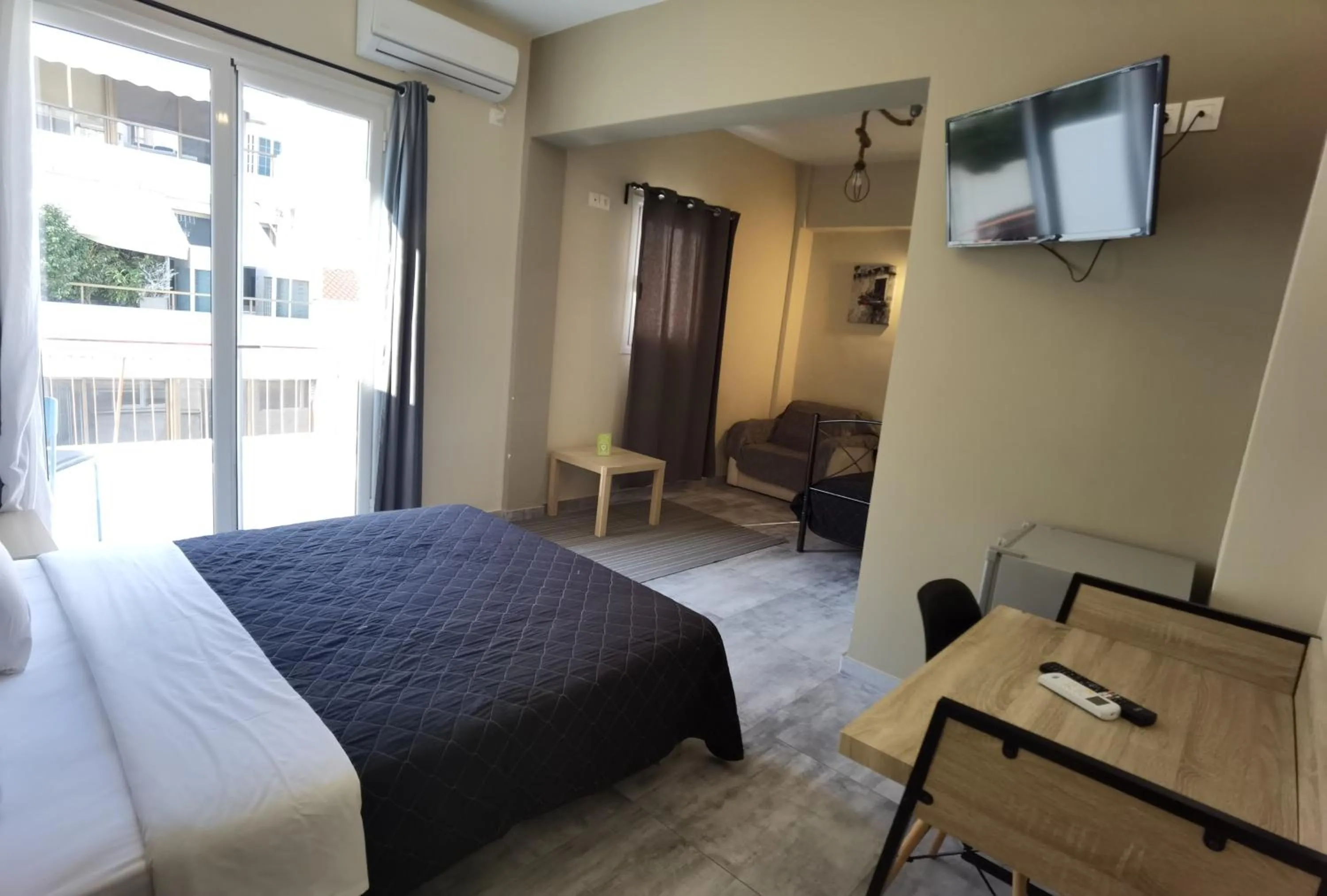 Photo of the whole room, Bed in Achillion Hotel Piraeus