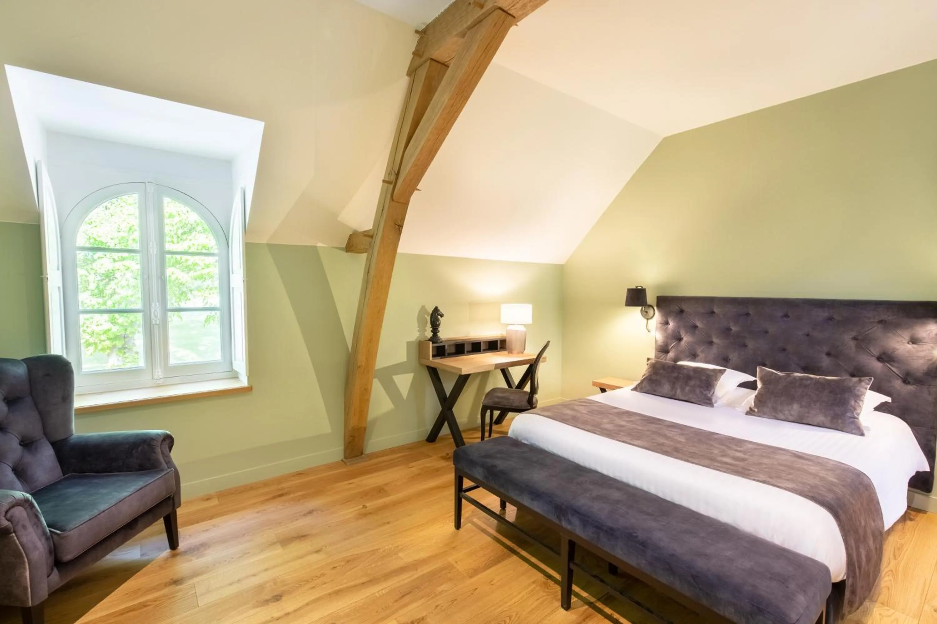 Bed in Hotel Haras De La Potardiere