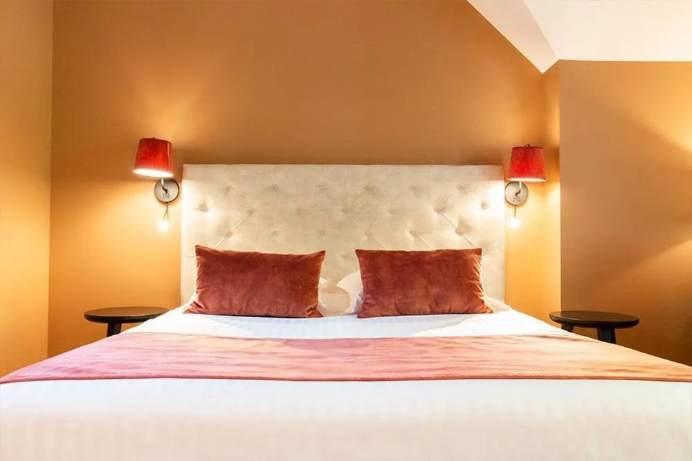 Bed in Hotel Haras De La Potardiere