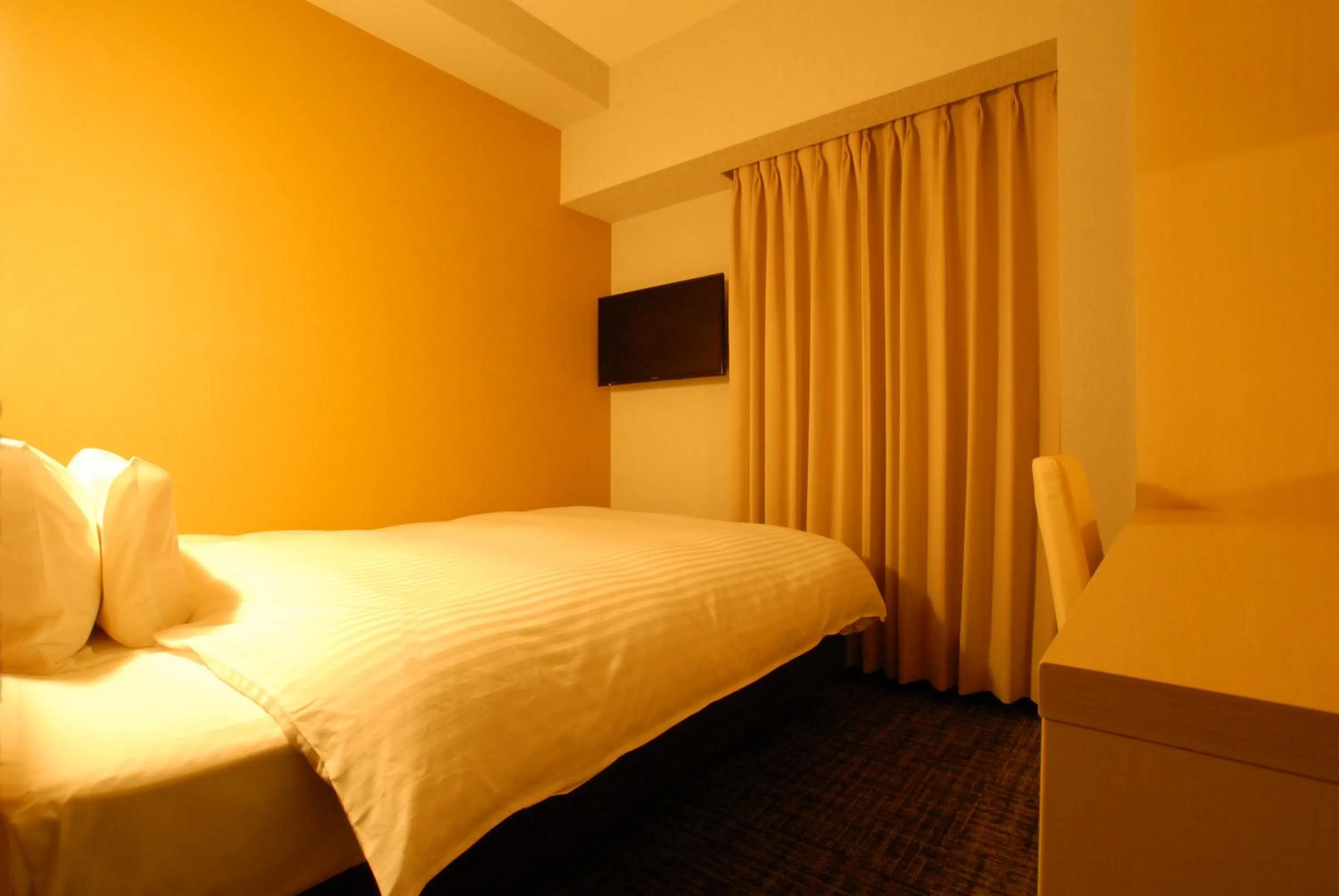 Bed in AB Hotel Fuji