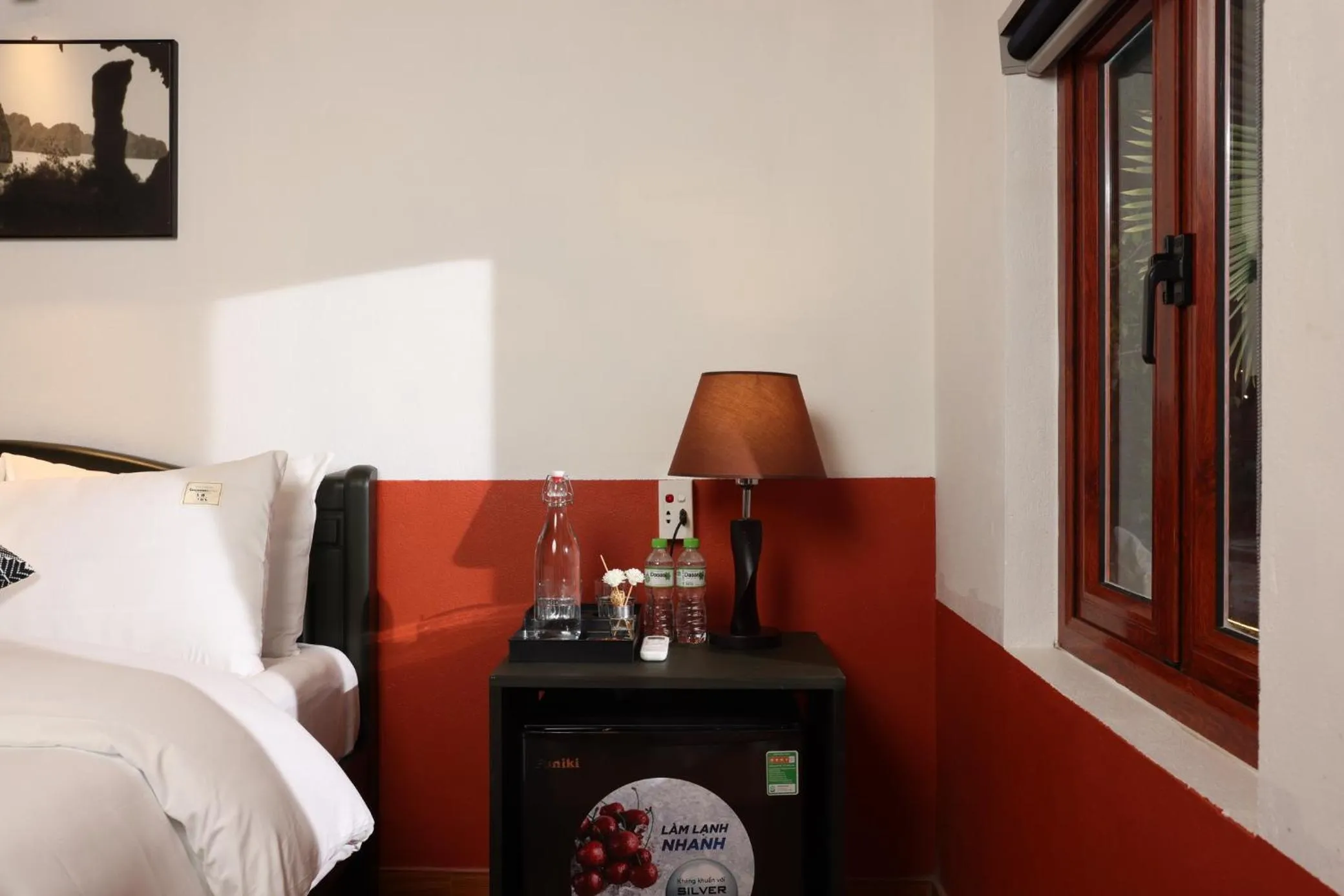 Seating area, Bed in Cat Ba Serena Homestay And Swimming Pool