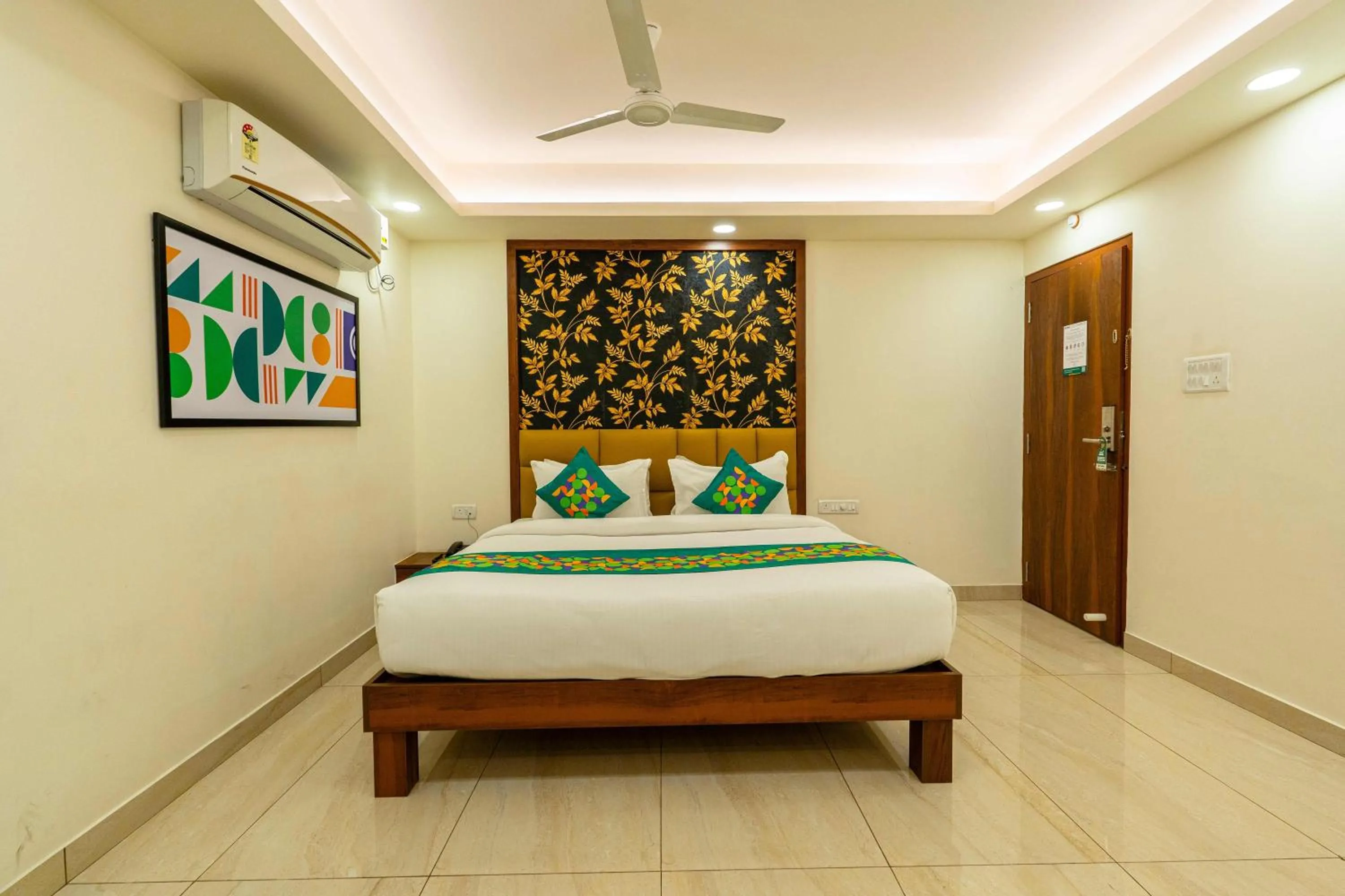 Bedroom, Bed in Treebo Kings Orchid