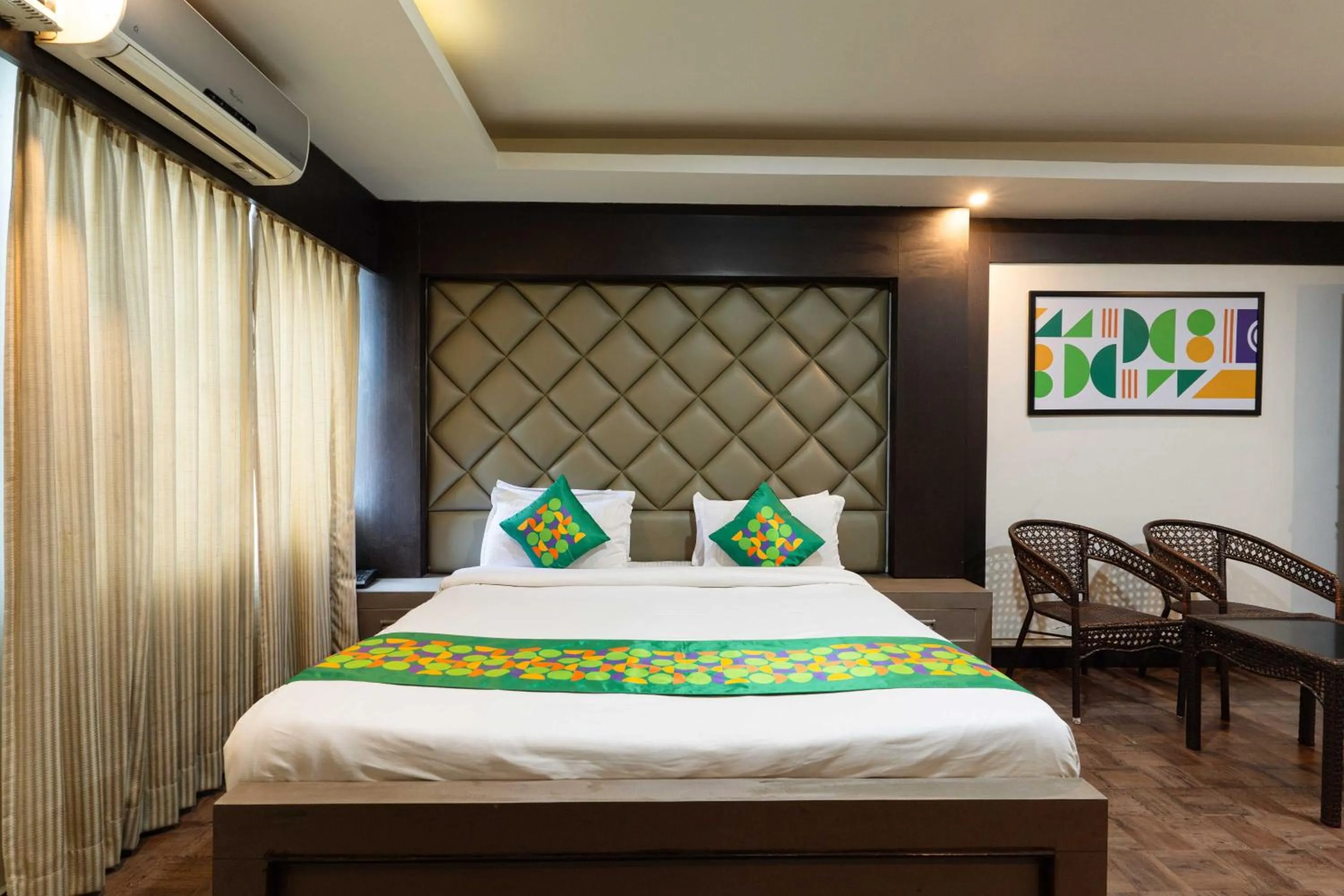 Bedroom, Bed in Treebo Kings Orchid