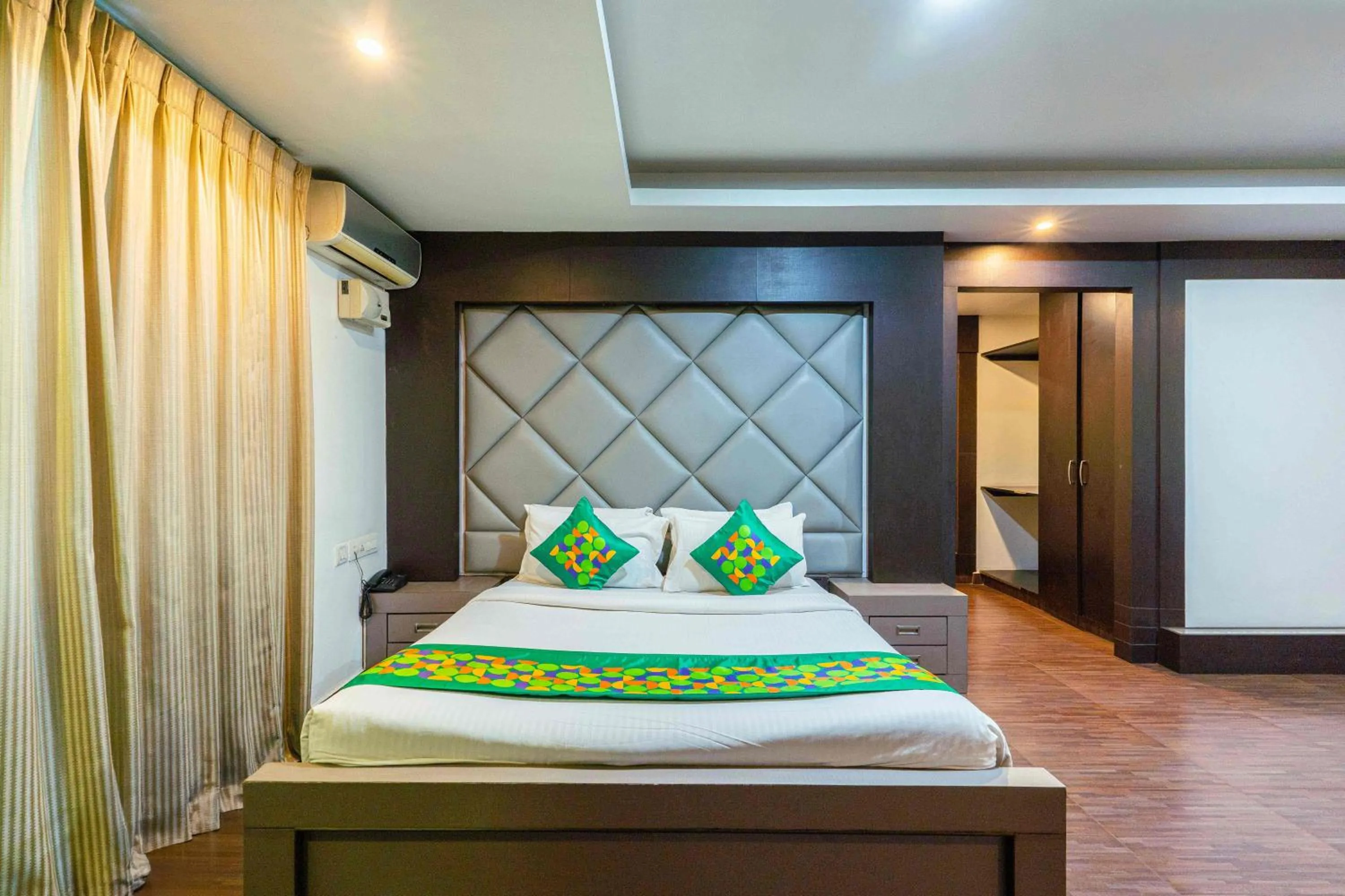 Bedroom, Bed in Treebo Kings Orchid