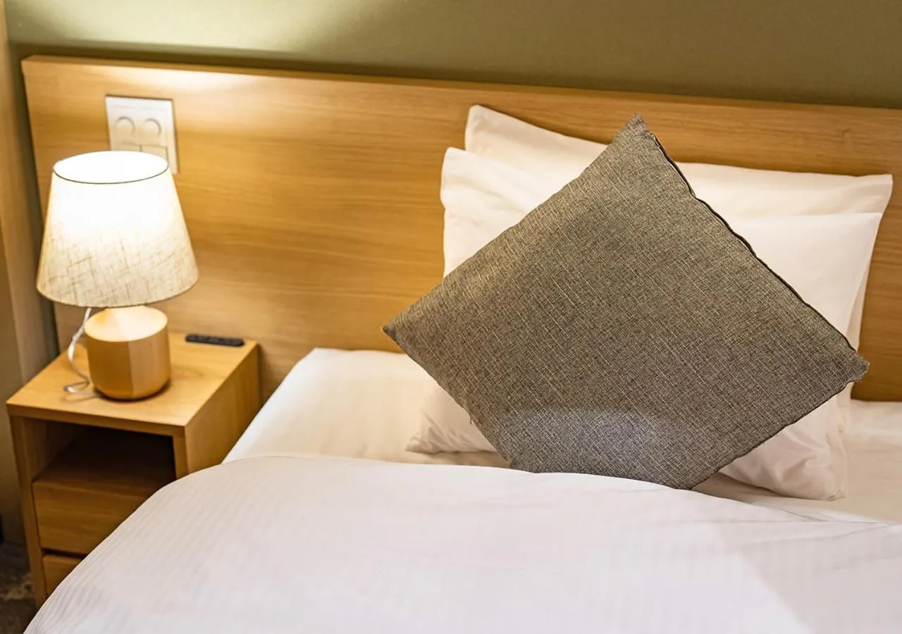 Bed in Stay SAKURA Tokyo Asakusa Yokozuna Hotel