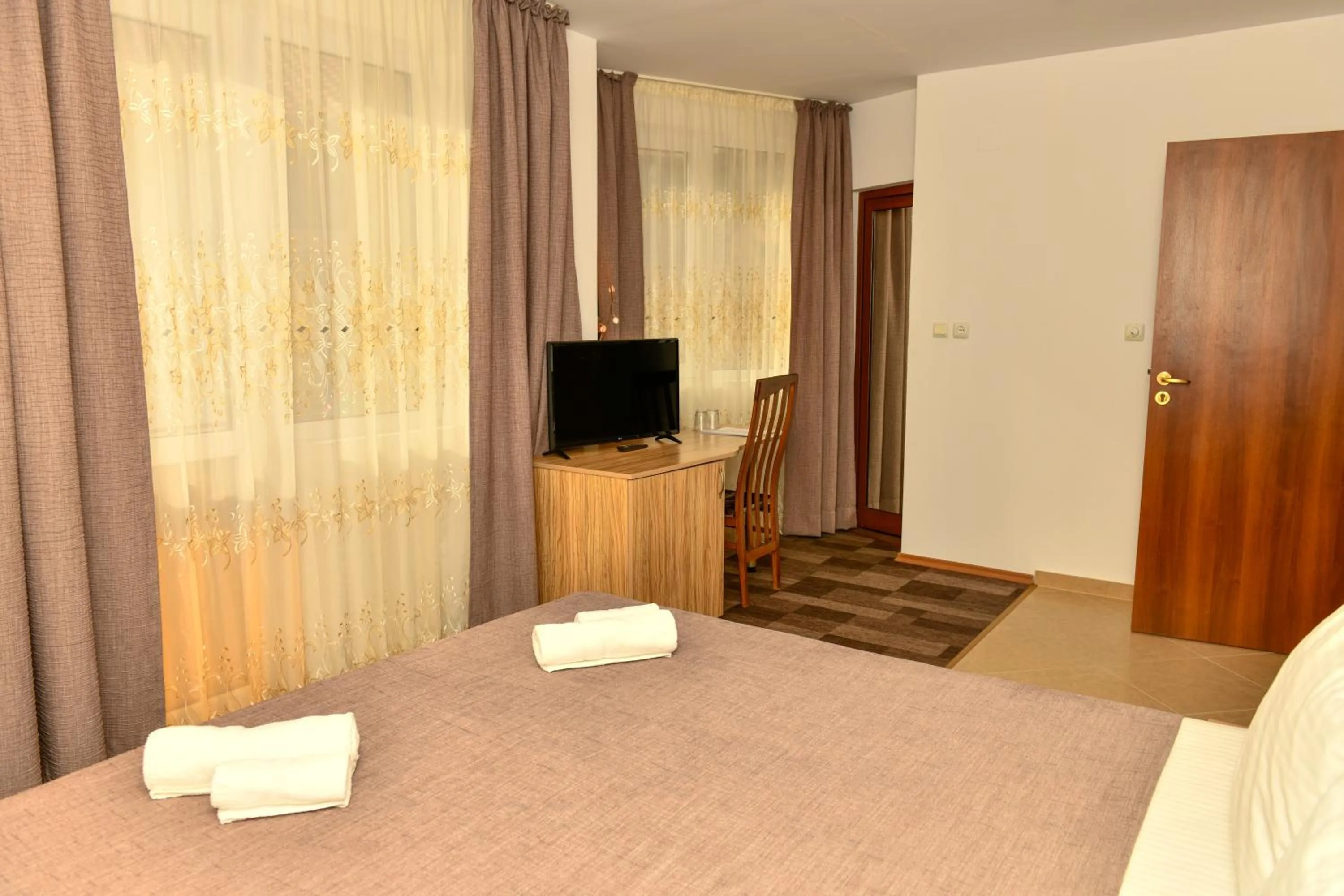 Bed in Blyan Family Hotel