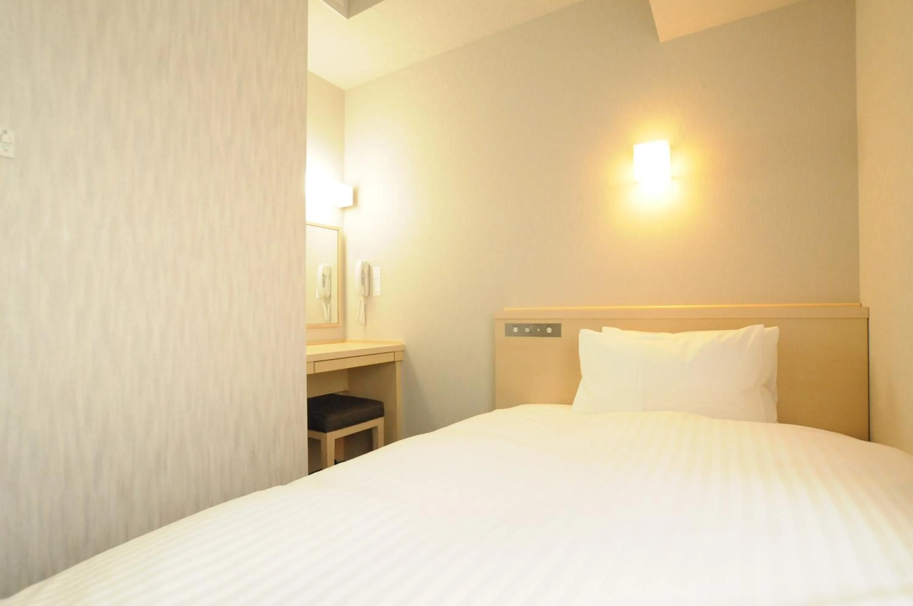 Bed in AB Hotel Omihachiman