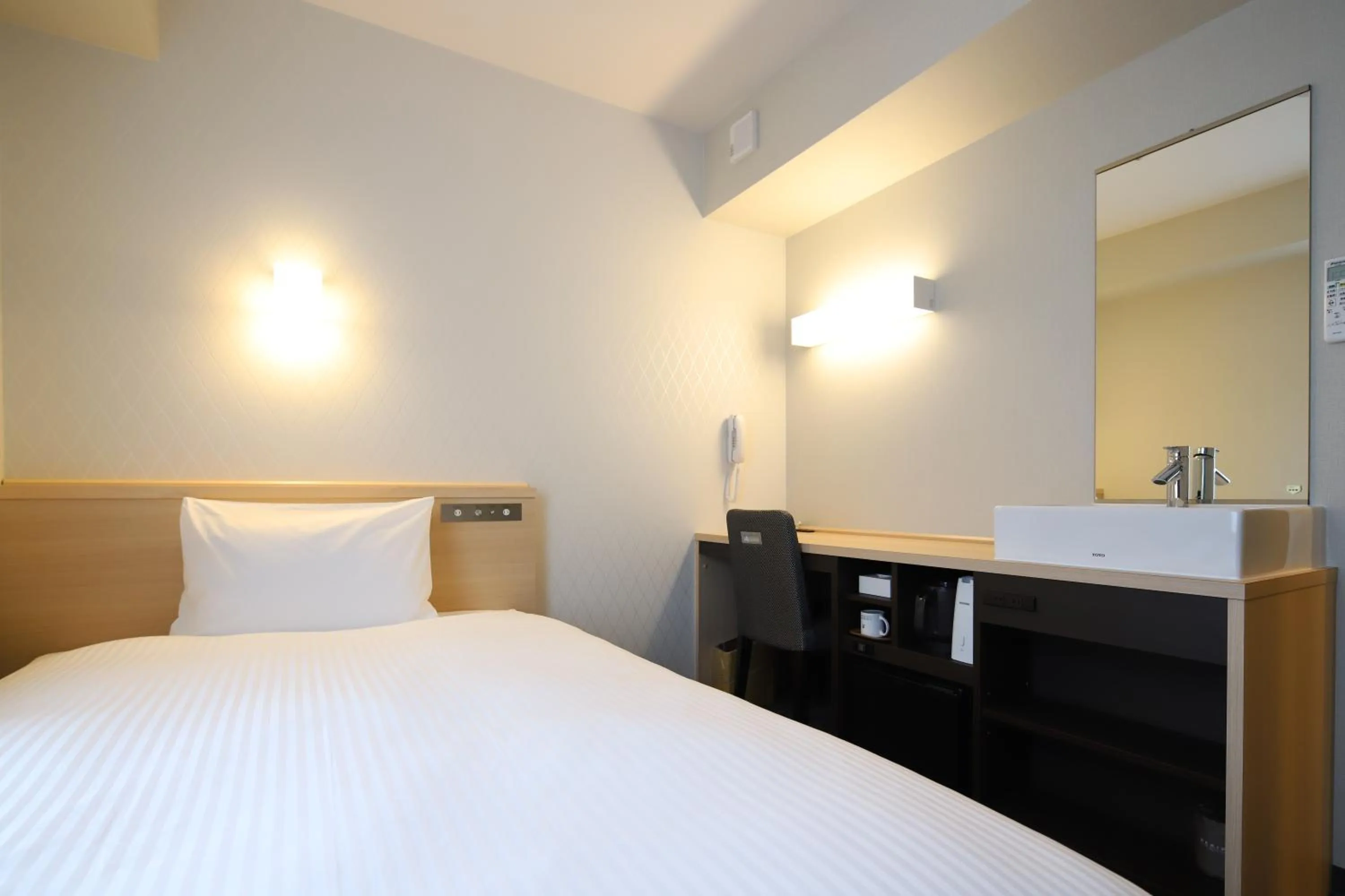 Bed in AB Hotel Osaka Sakaisuji Hommachi