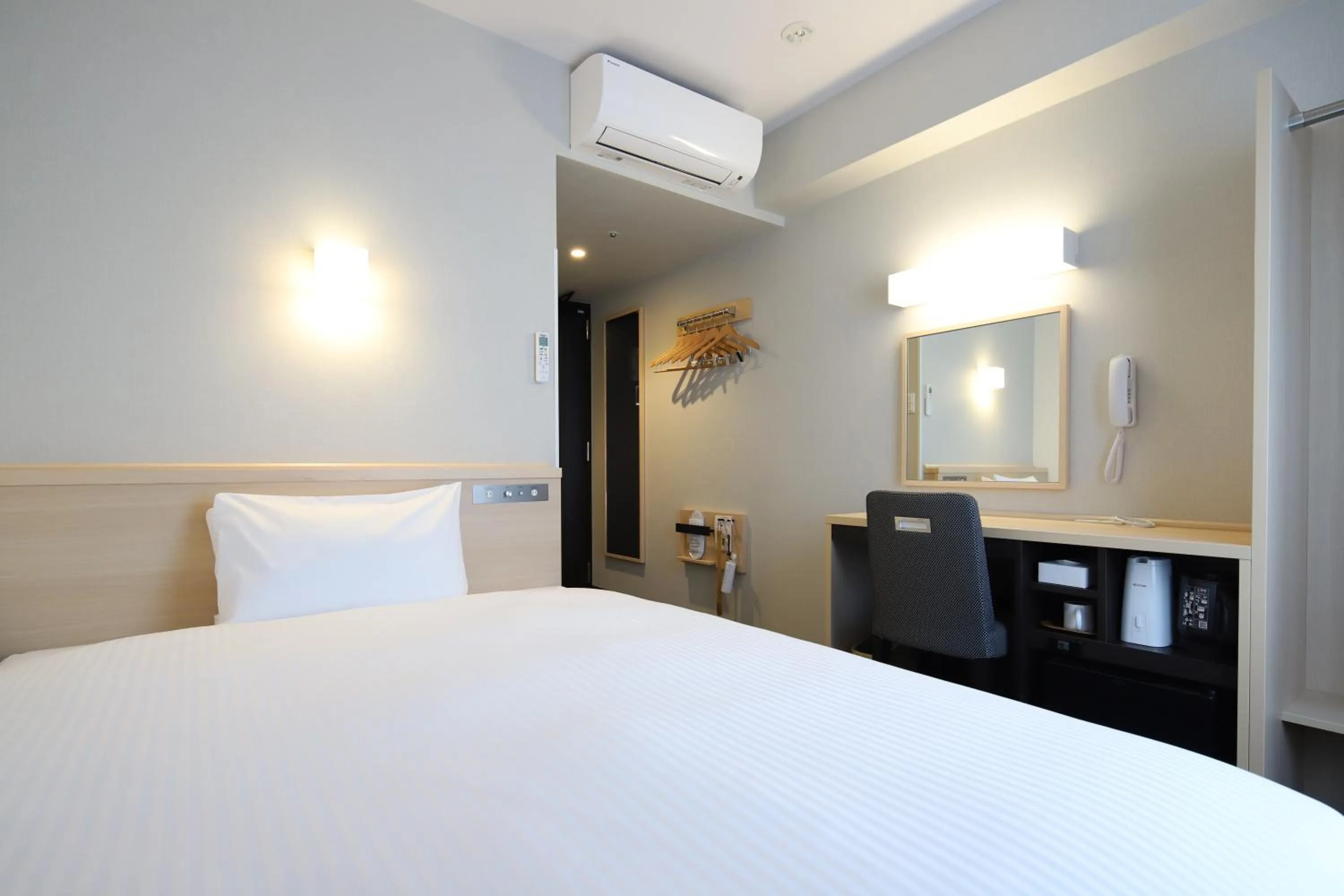 Bed in AB Hotel Osaka Sakaisuji Hommachi