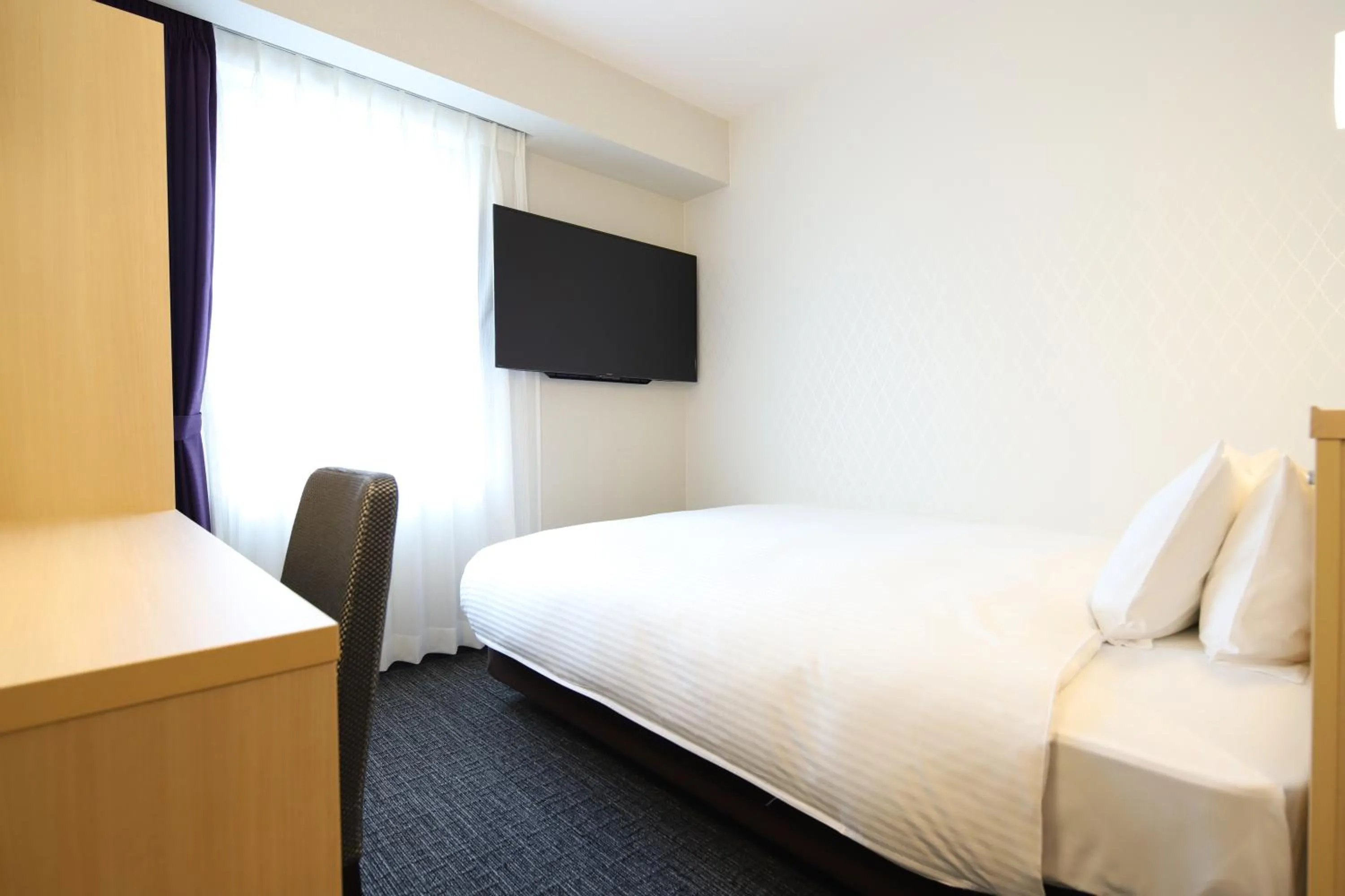 Bed in AB Hotel Osaka Sakaisuji Hommachi