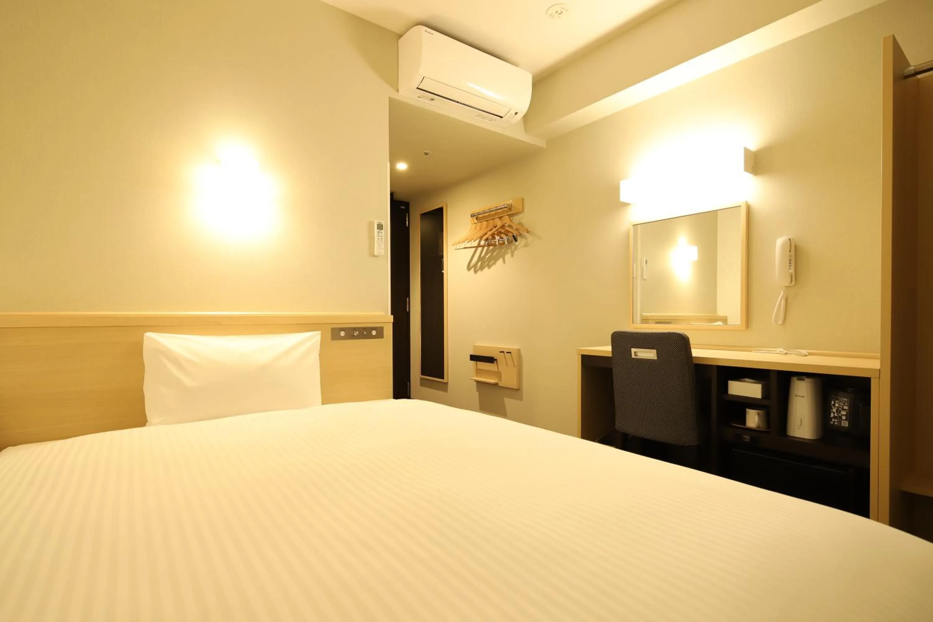 Bed in AB Hotel Osaka Sakaisuji Hommachi