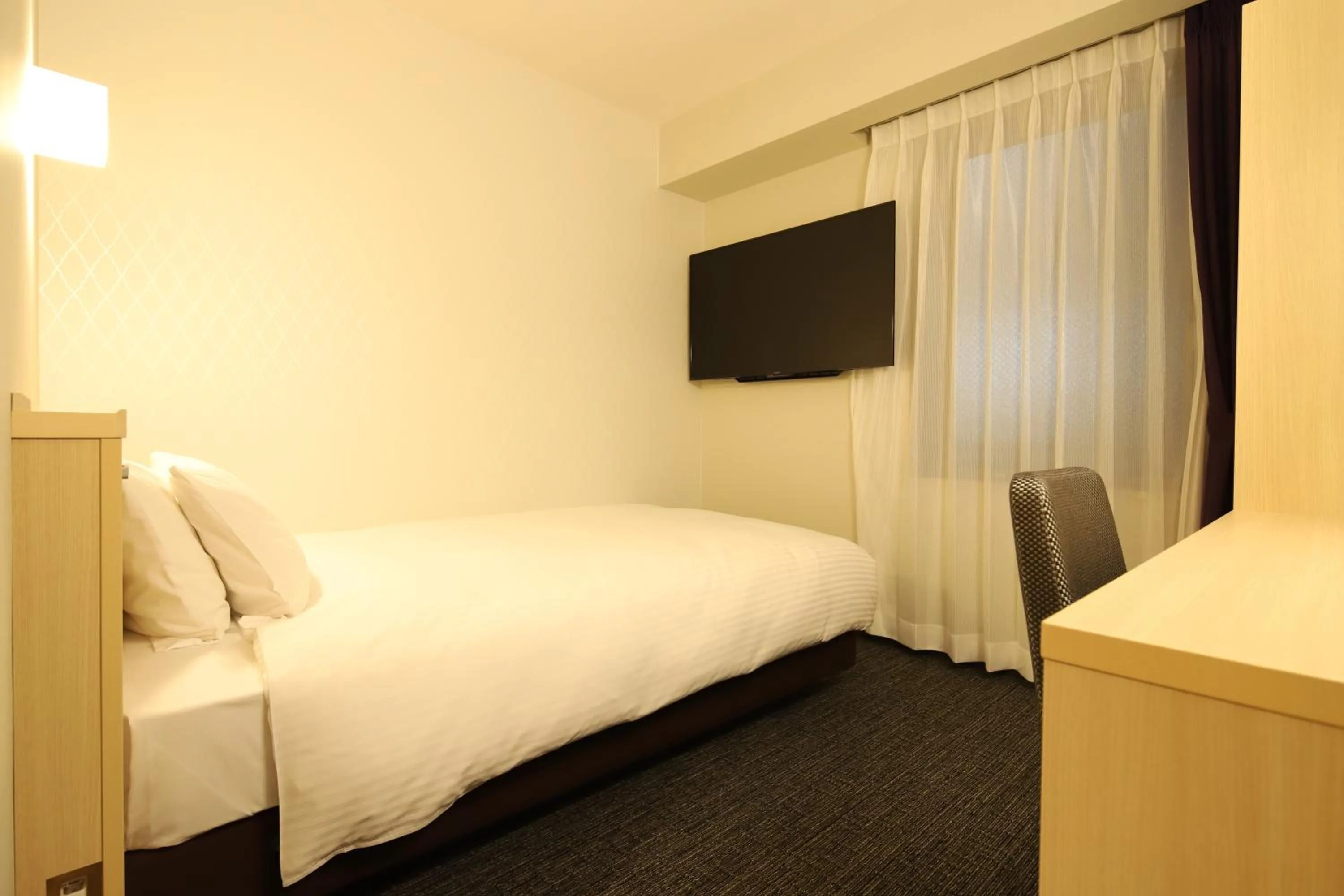 Bed in AB Hotel Osaka Sakaisuji Hommachi