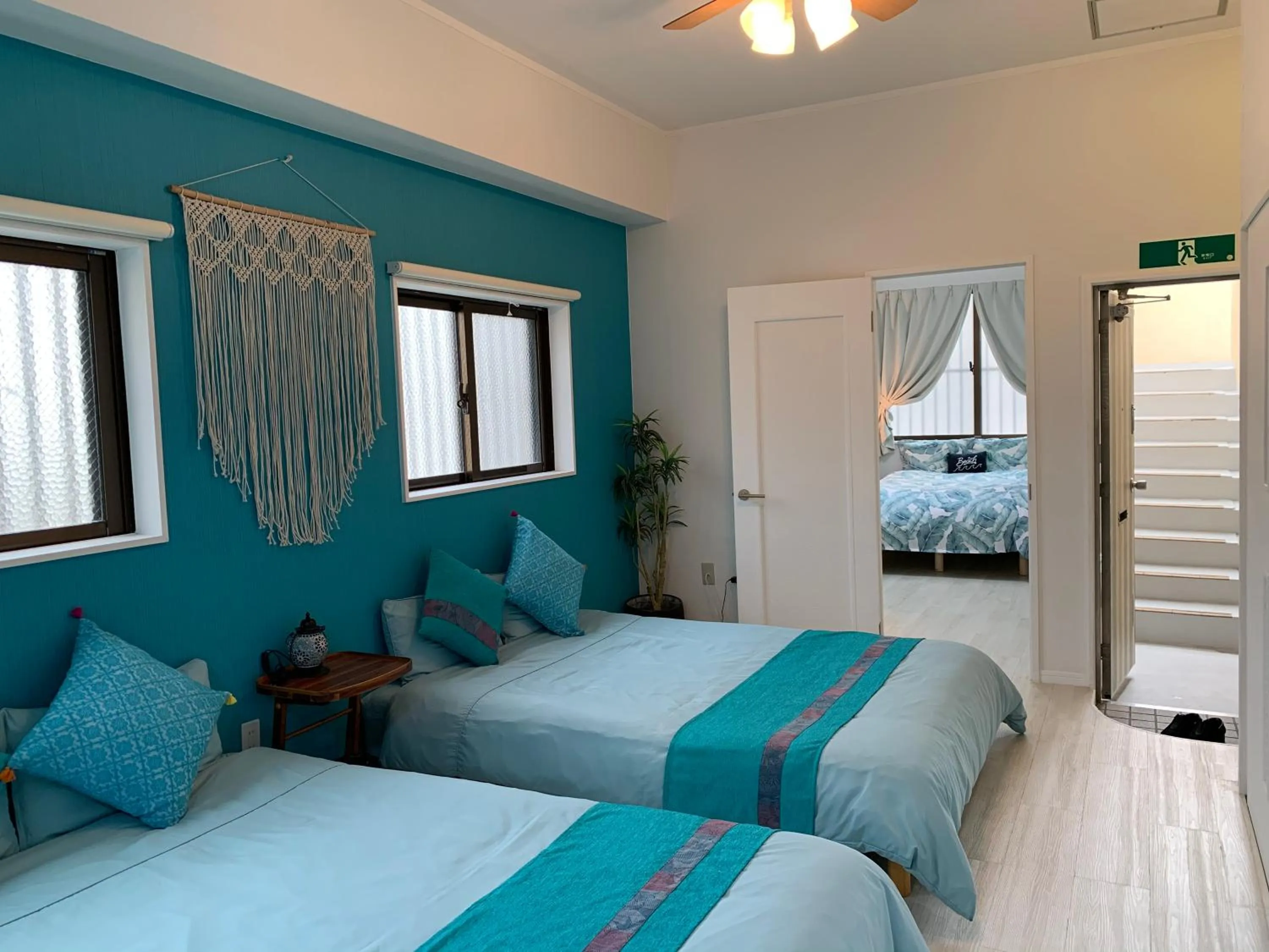 Bedroom, Bed in Maximum of 21 people can be rented in one building 3 minutes walk to Tomari Port 10 minutes drive to the airport No parking lot 30 seconds walk from paid parking lot warayunso port city May