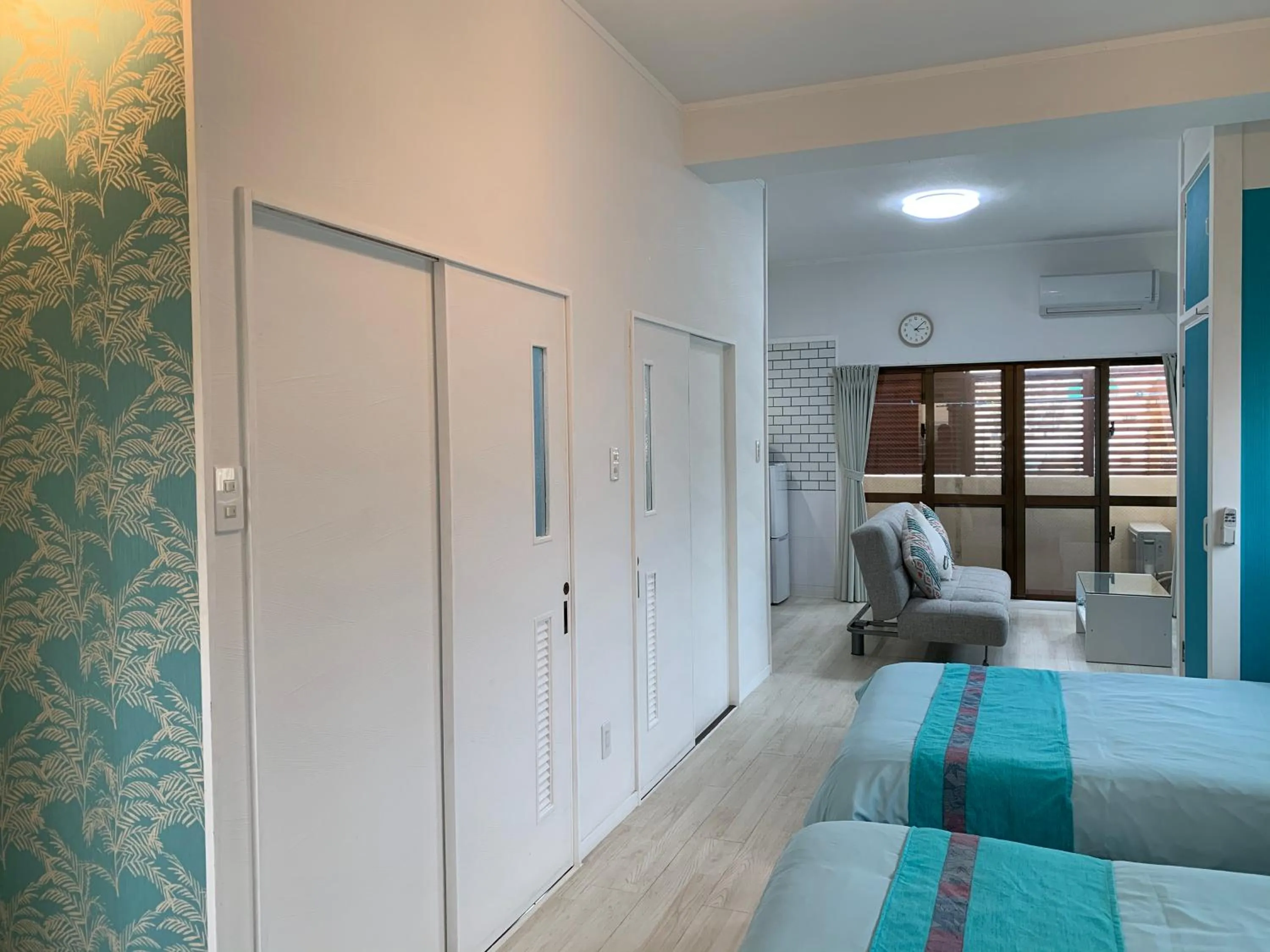 Living room, Bed in Maximum of 21 people can be rented in one building 3 minutes walk to Tomari Port 10 minutes drive to the airport No parking lot 30 seconds walk from paid parking lot warayunso port city May