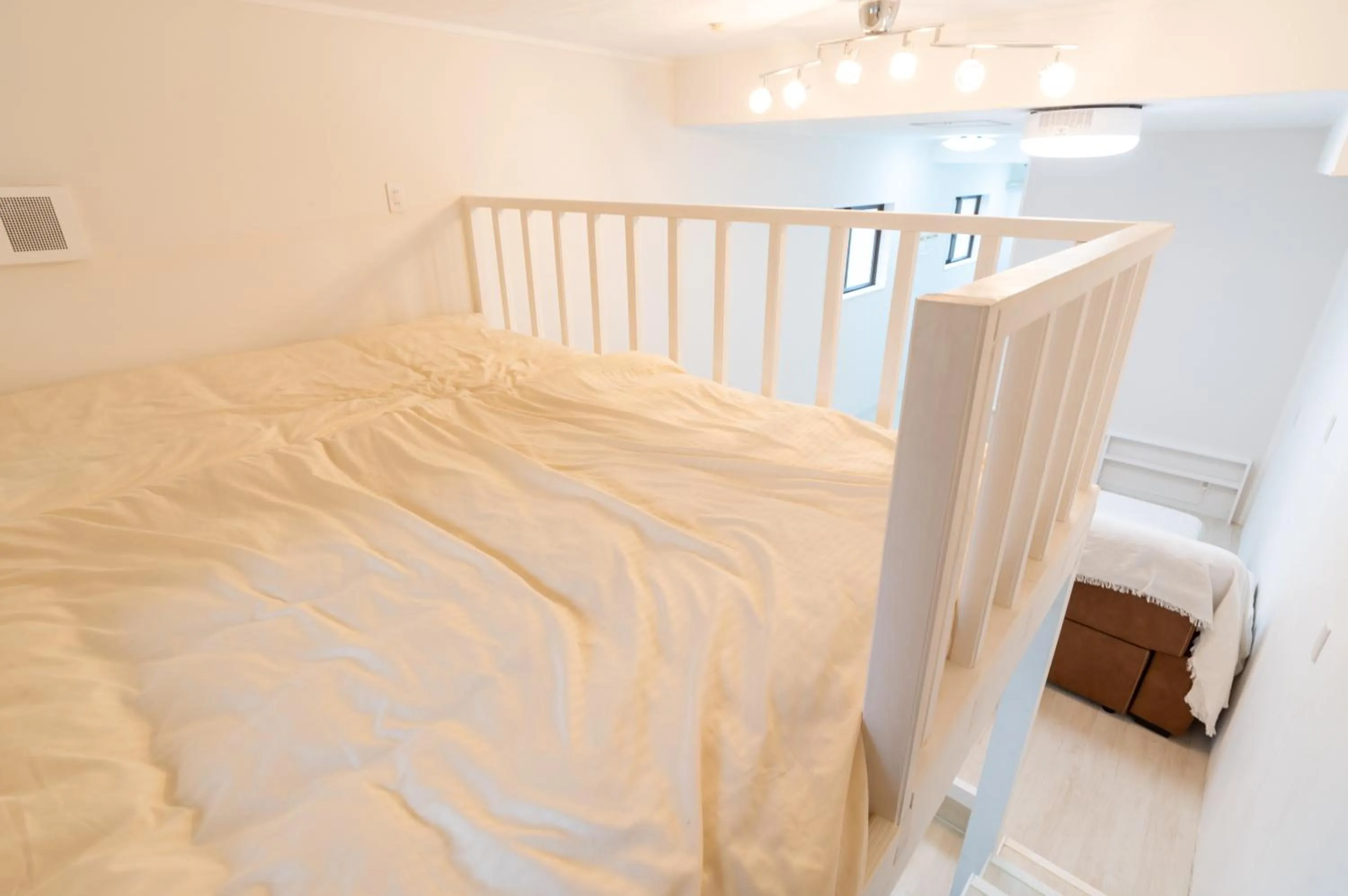 Bedroom, Bed in Maximum of 21 people can be rented in one building 3 minutes walk to Tomari Port 10 minutes drive to the airport No parking lot 30 seconds walk from paid parking lot warayunso port city May