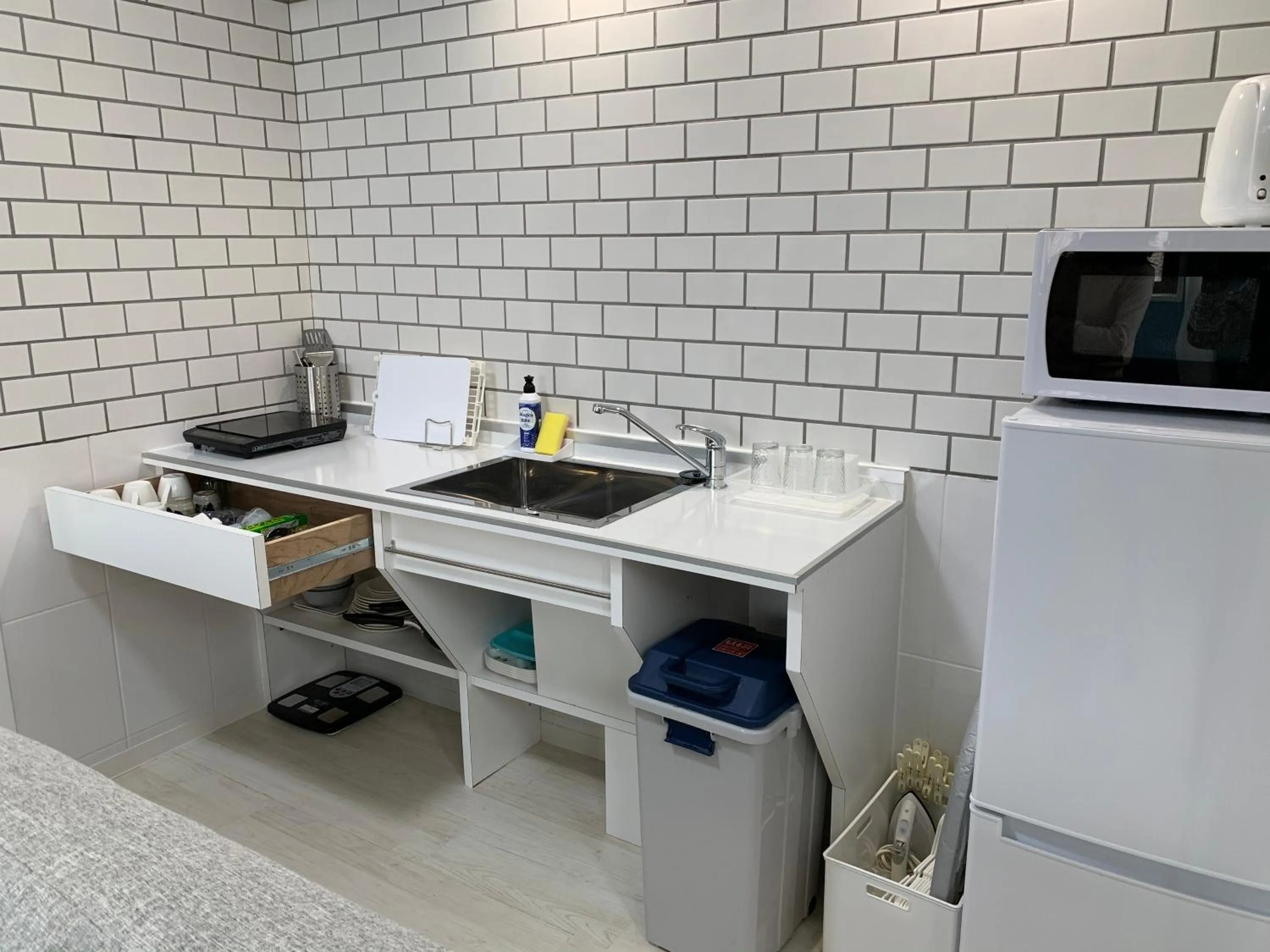 Kitchen or kitchenette in Maximum of 21 people can be rented in one building 3 minutes walk to Tomari Port 10 minutes drive to the airport No parking lot 30 seconds walk from paid parking lot warayunso port city May