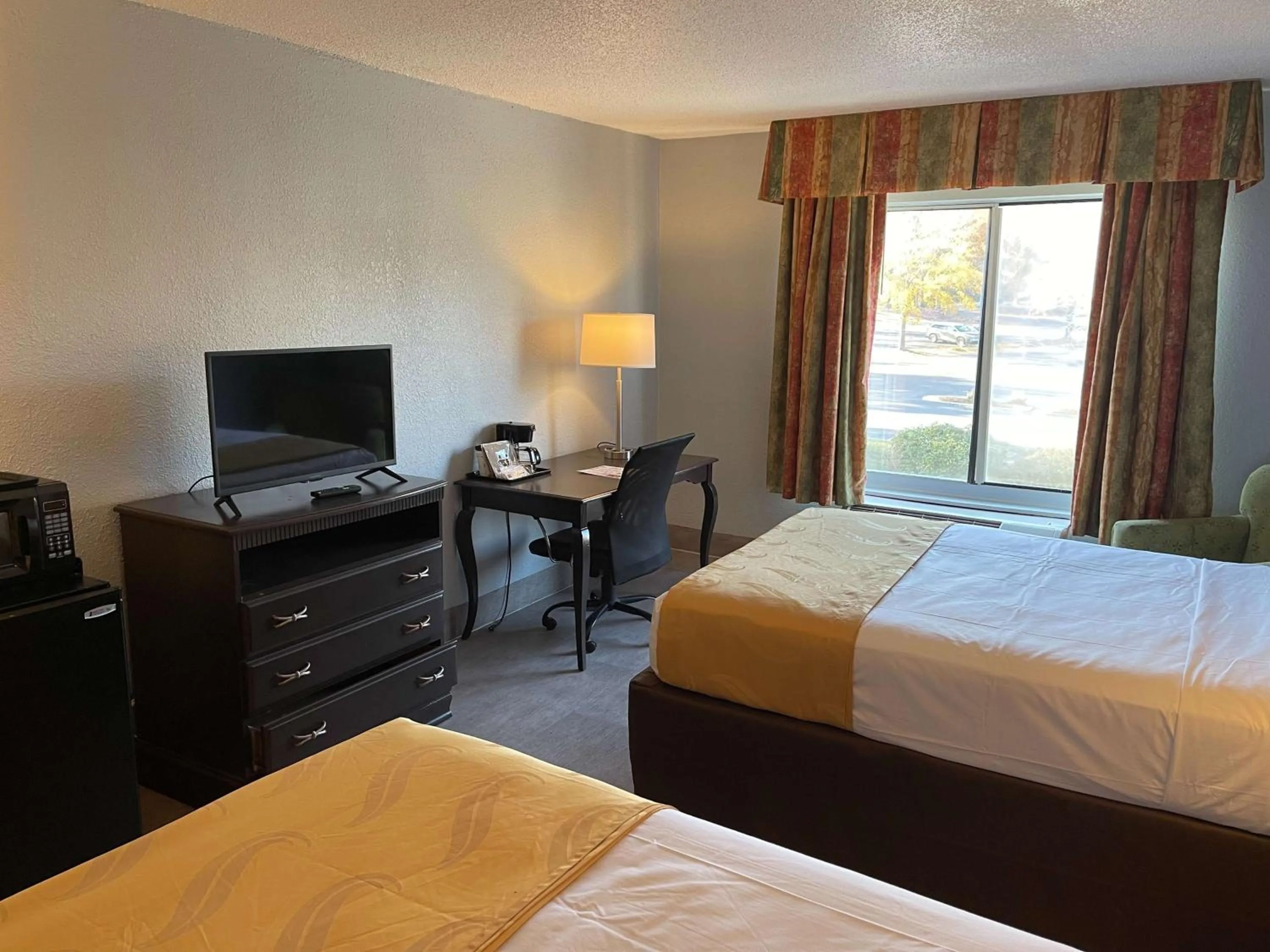 Bed in SureStay Plus Hotel by Best Western Durham Medical Center