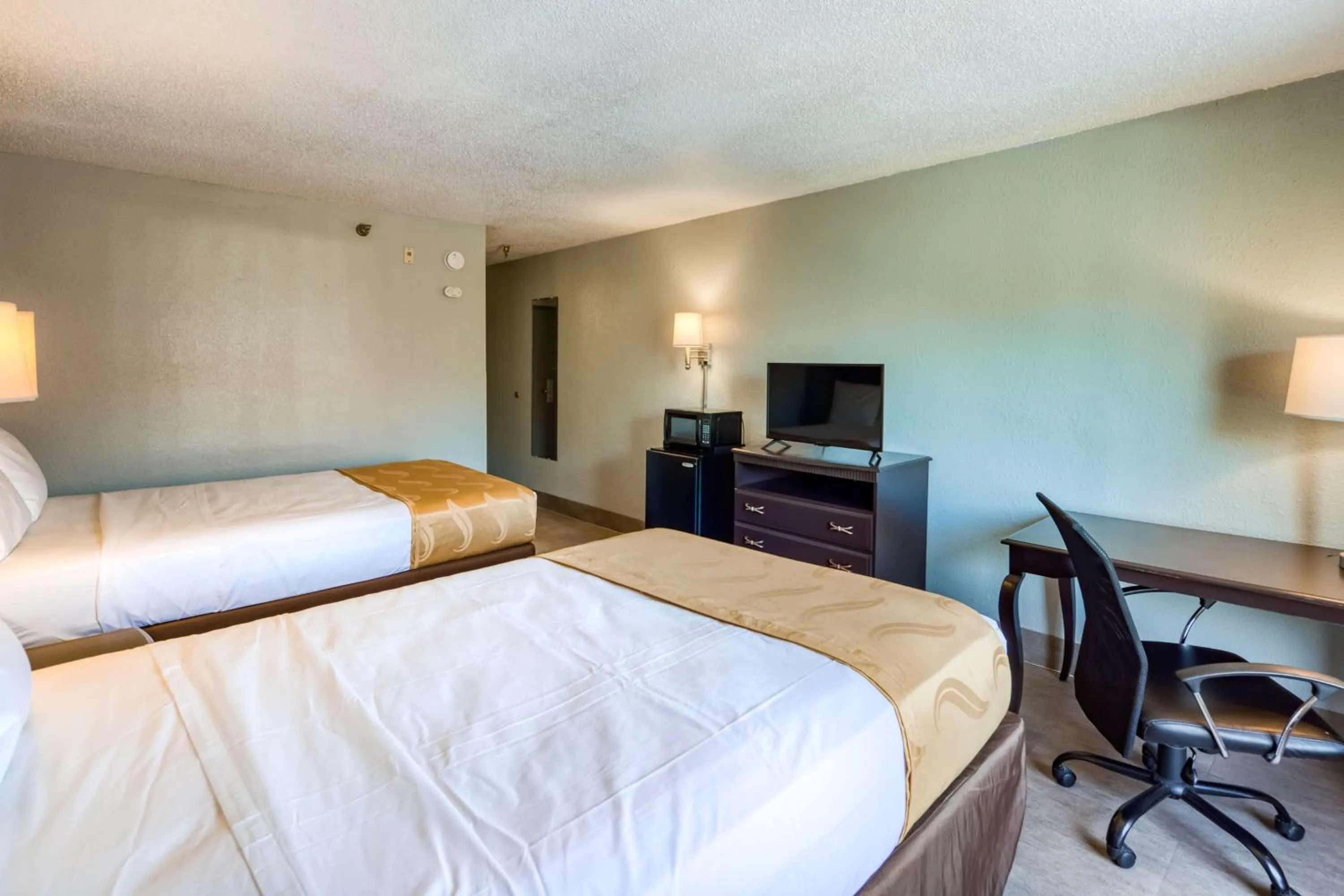 Bed in SureStay Plus Hotel by Best Western Durham Medical Center