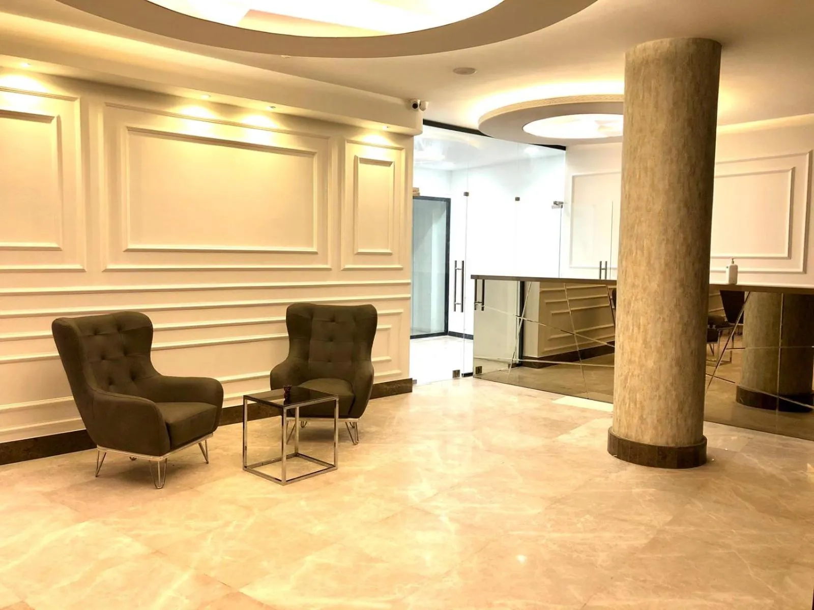 Lobby or reception in Le Luxe Suites Hotel