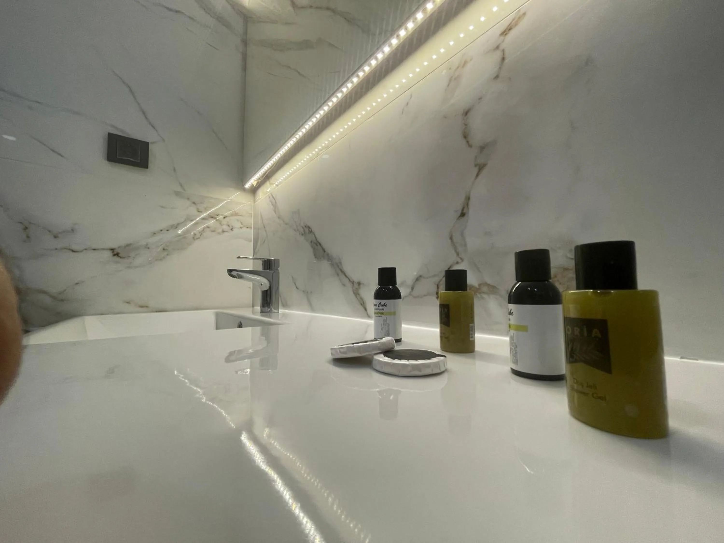 Bathroom in Le Luxe Suites Hotel