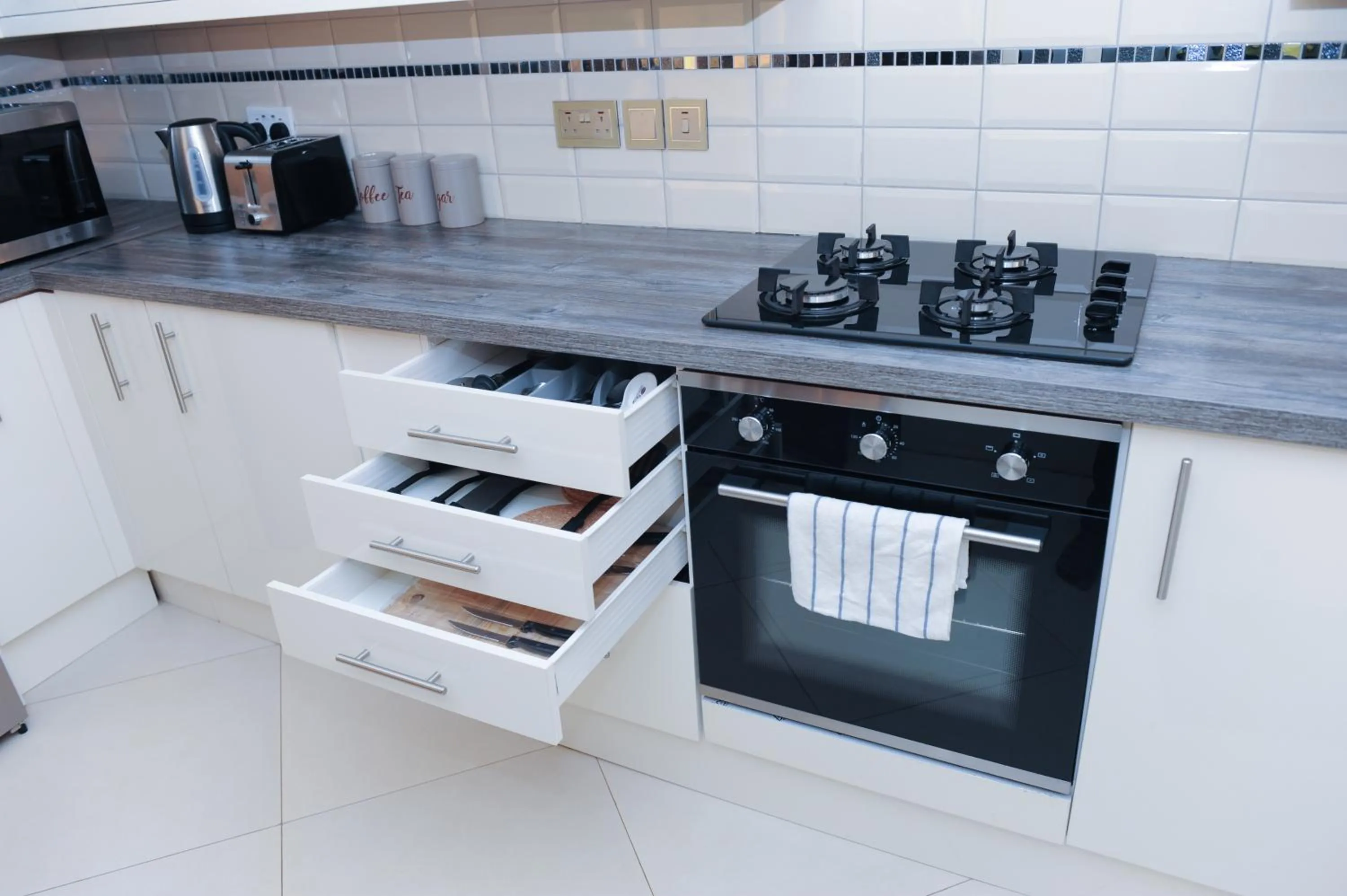 Kitchen or kitchenette in Eric Wilkins Apartments