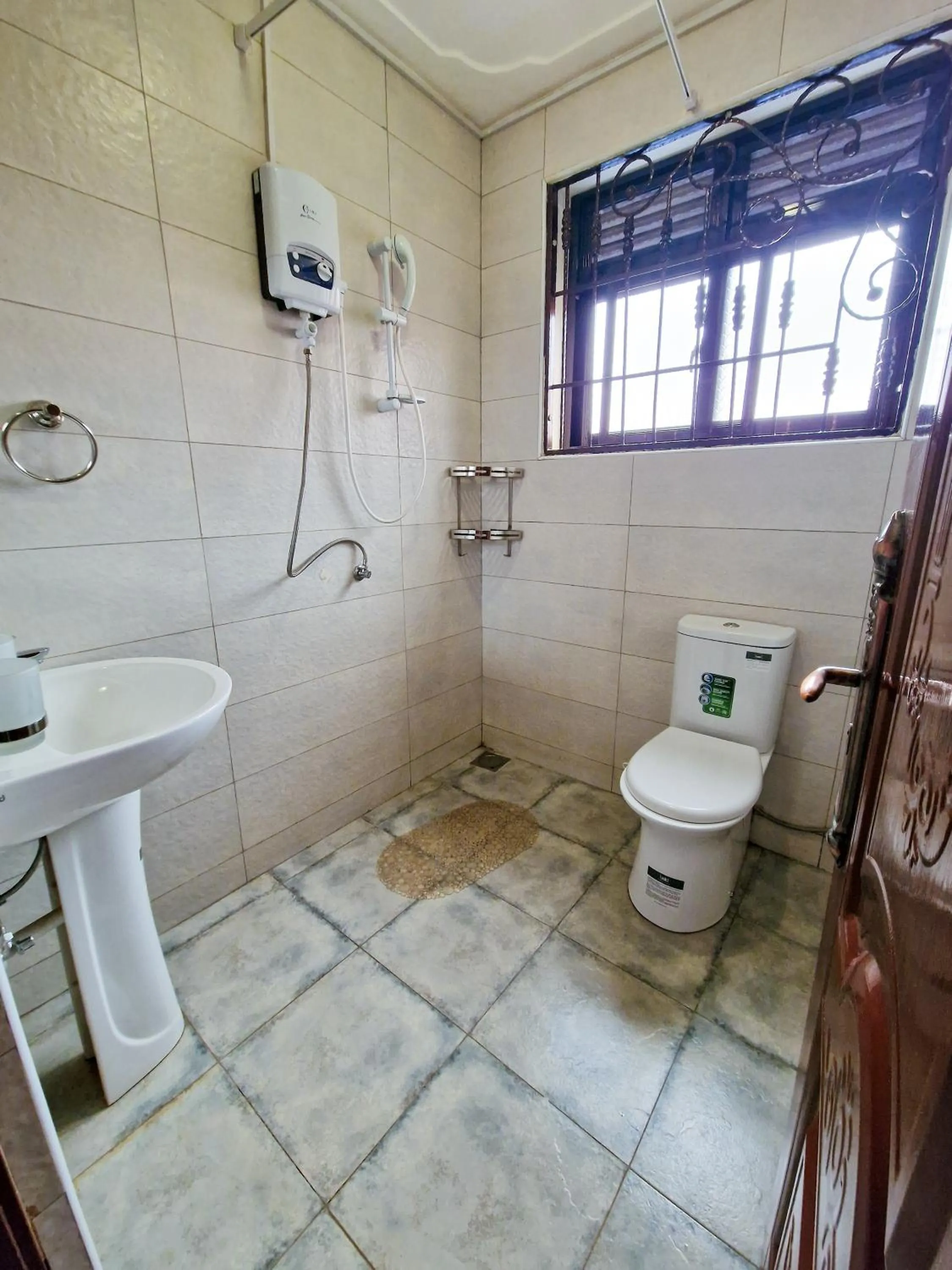 Toilet in Eric Wilkins Apartments