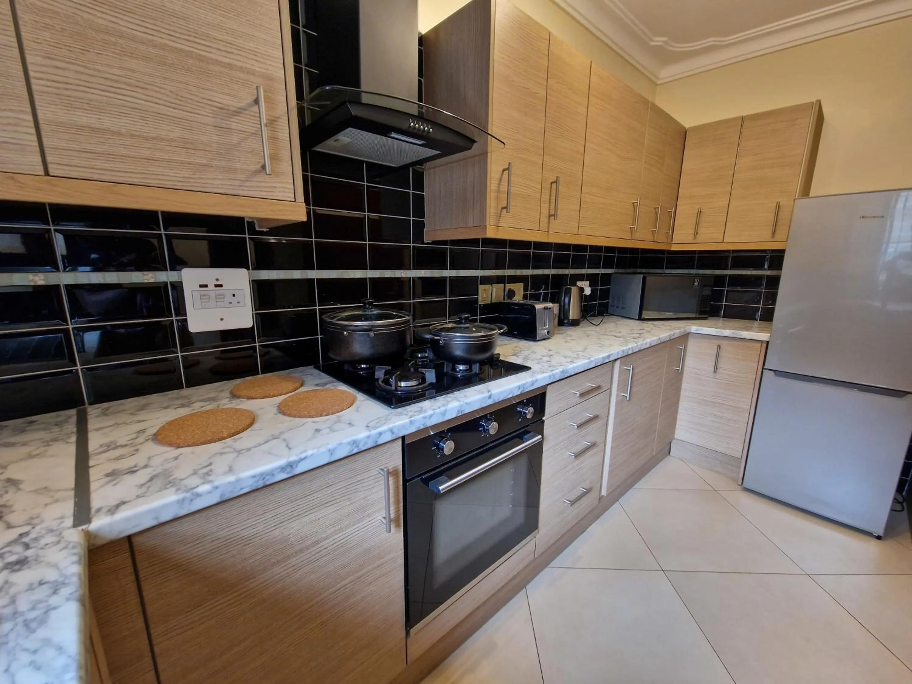 Kitchen or kitchenette in Eric Wilkins Apartments