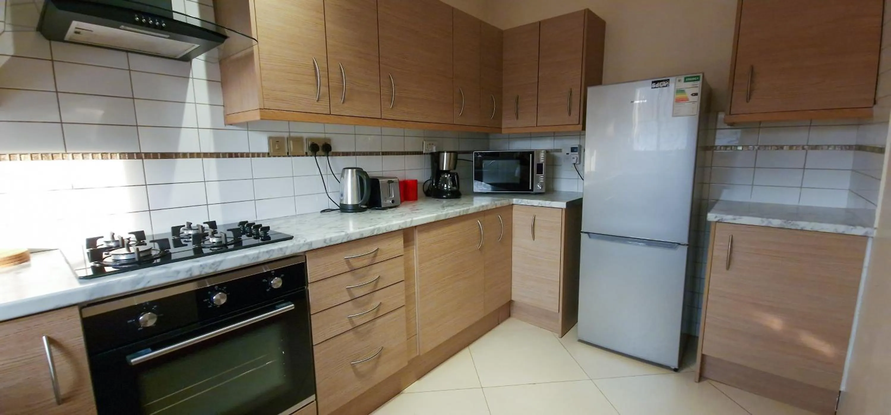 Kitchen or kitchenette in Eric Wilkins Apartments