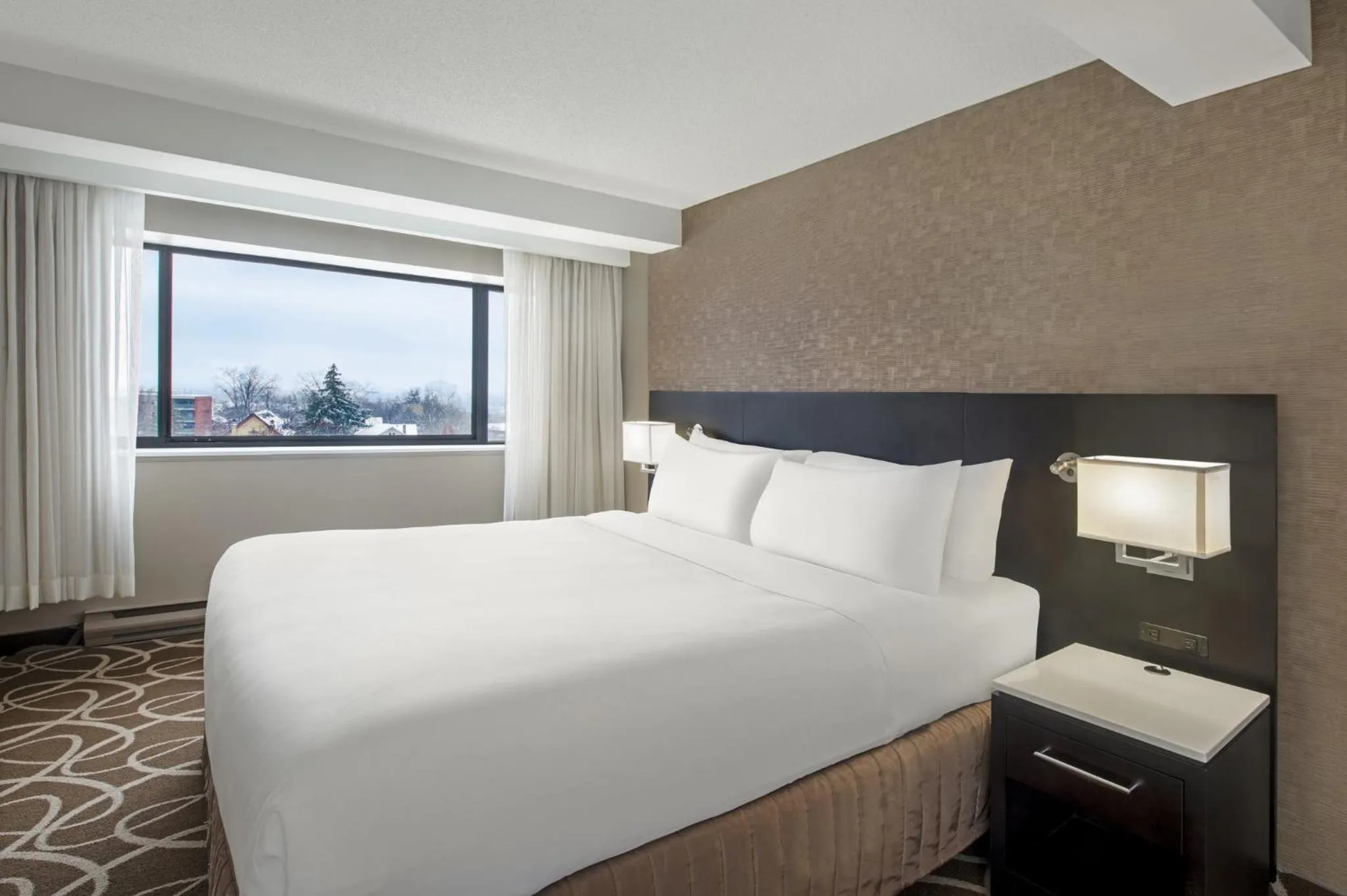 Photo of the whole room, Bed in Crowne Plaza Kitchener-Waterloo by IHG