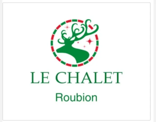 Property logo or sign in Le Chalet