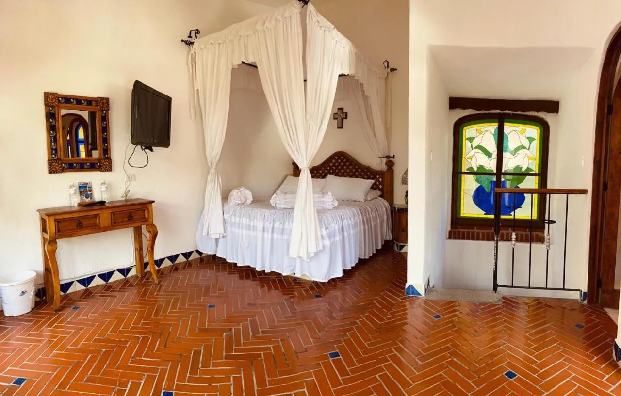Photo of the whole room, Bed in Posada Los Alcatraces