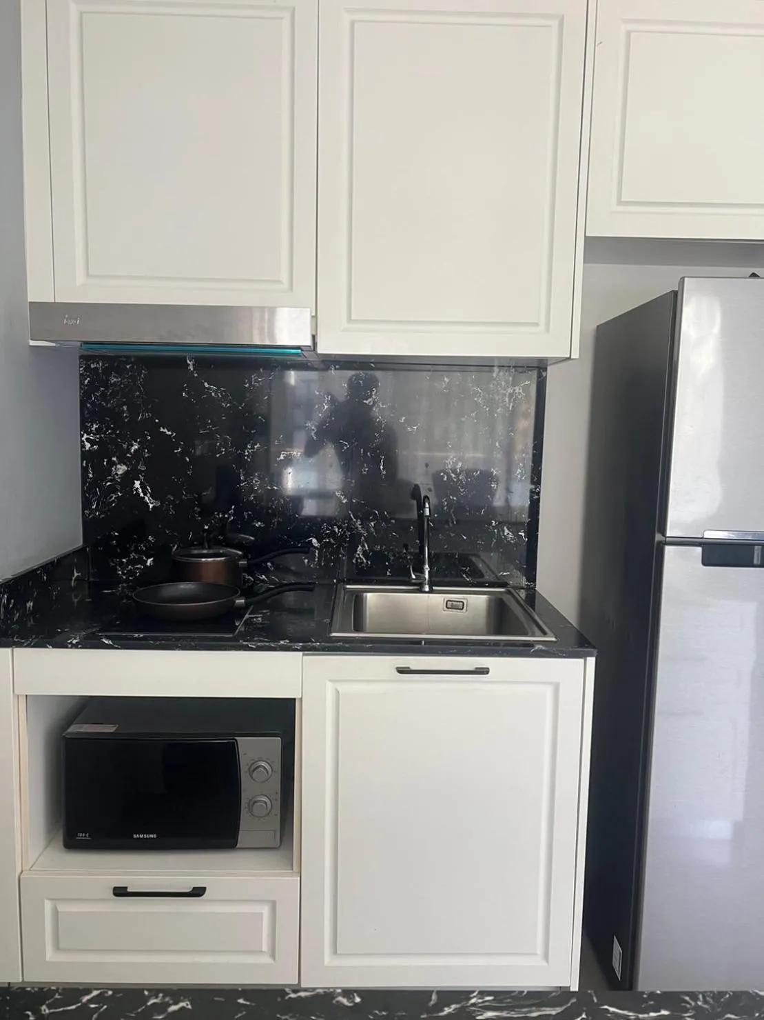 Kitchen or kitchenette in Palmyrah Surin Beach Residence