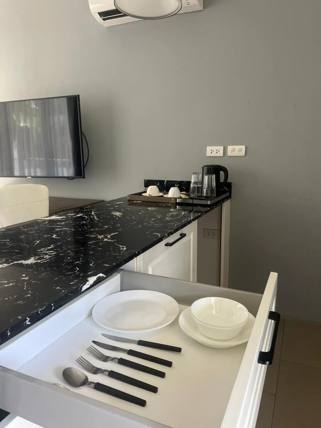 Kitchen or kitchenette in Palmyrah Surin Beach Residence