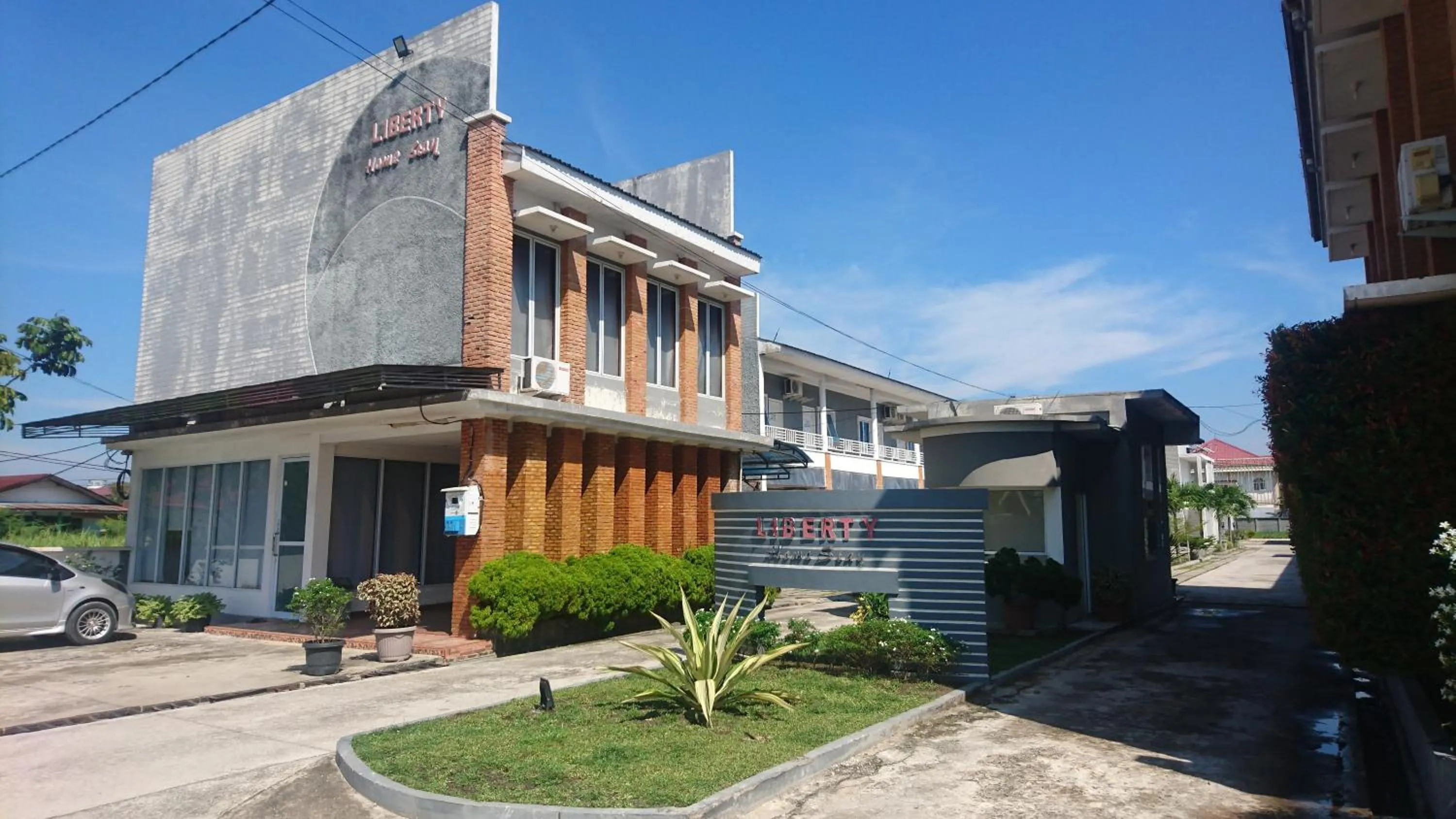 Property logo or sign in Liberty Homestay