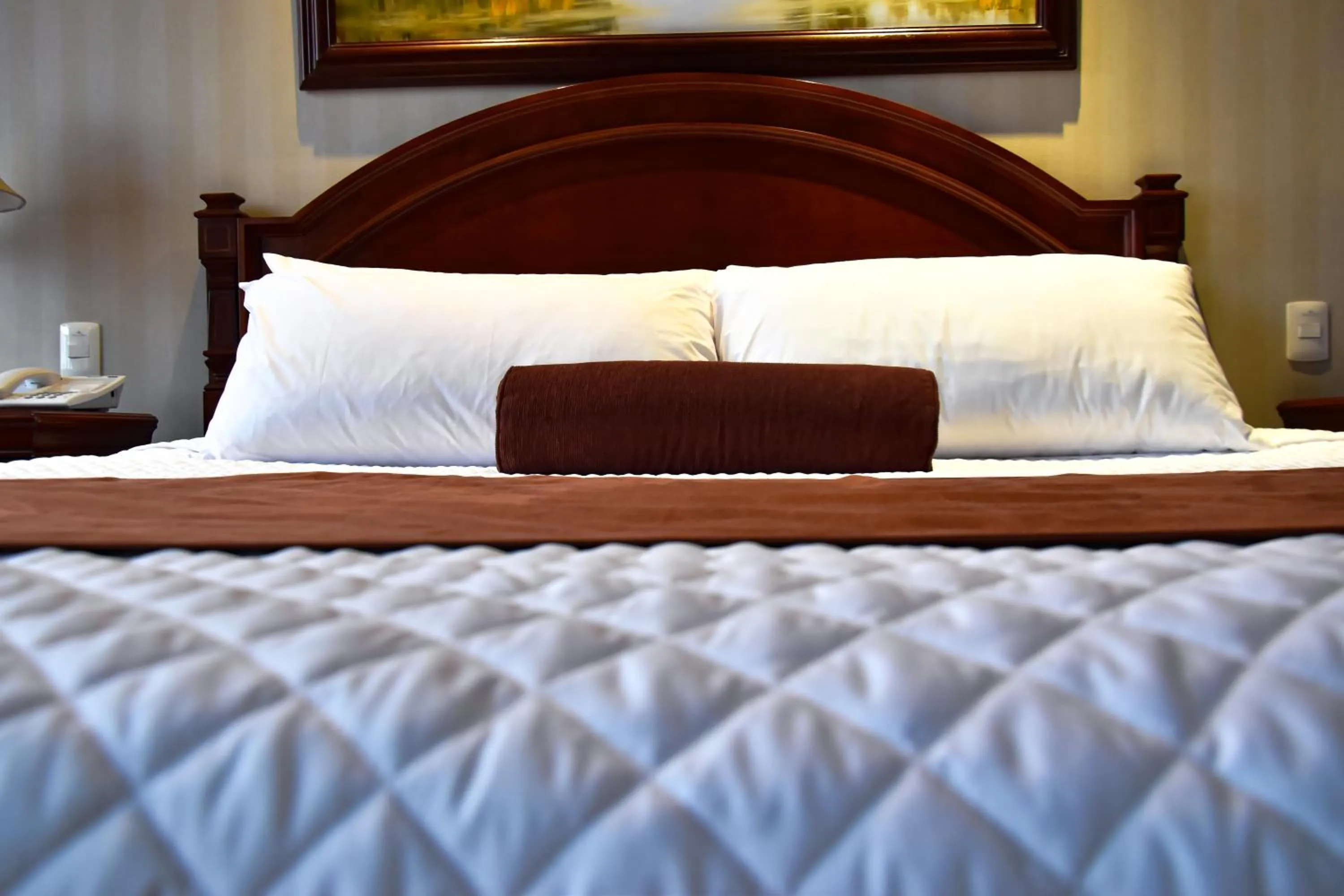 Bed in Grand Victoria Boutique Hotel