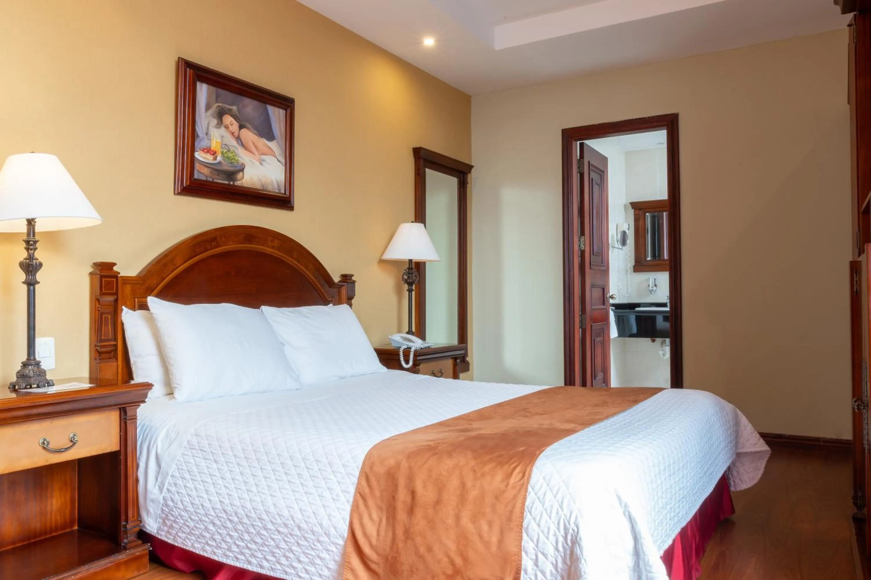 Bed in Grand Victoria Boutique Hotel