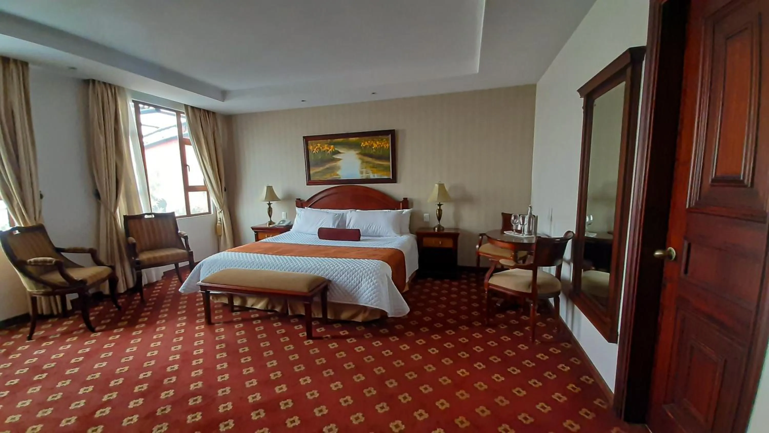 Bed in Grand Victoria Boutique Hotel