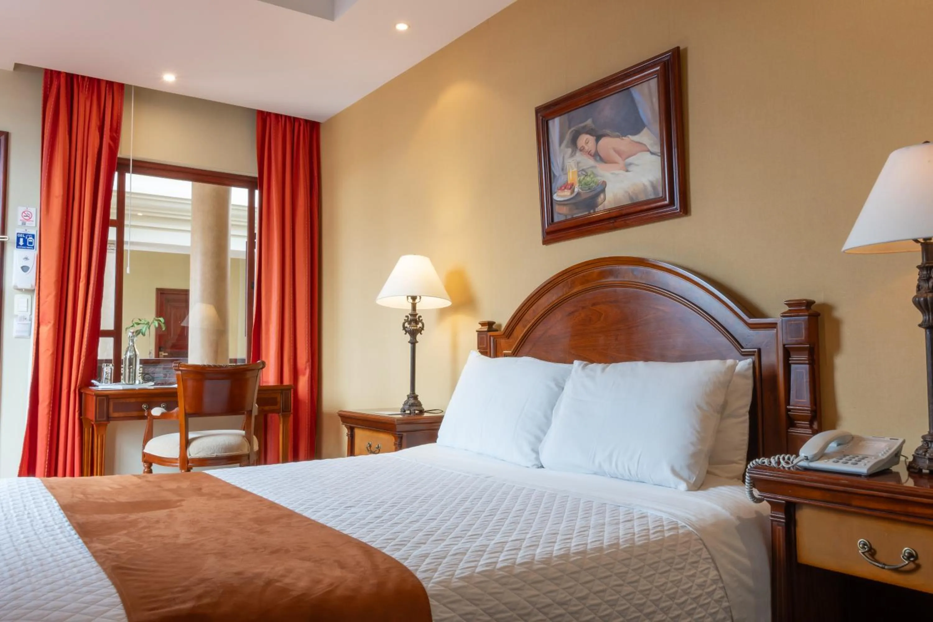 Bed in Grand Victoria Boutique Hotel